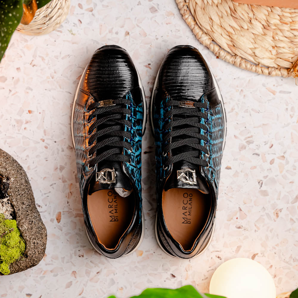 The Marco Di Milano Portici Navy / Black sneaker with black laces, a white midsole, and a textured black rubber outsole is shown on a plain white background, emphasizing its luxurious design.