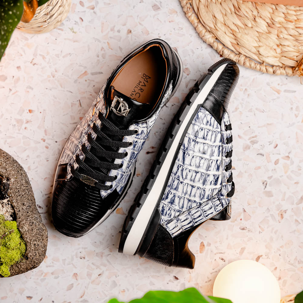 The Marco Di Milano Portici Newspaper / Black sneakers feature genuine crocodile leather in black and white with textured details and thick rubber soles, shown on a white background.