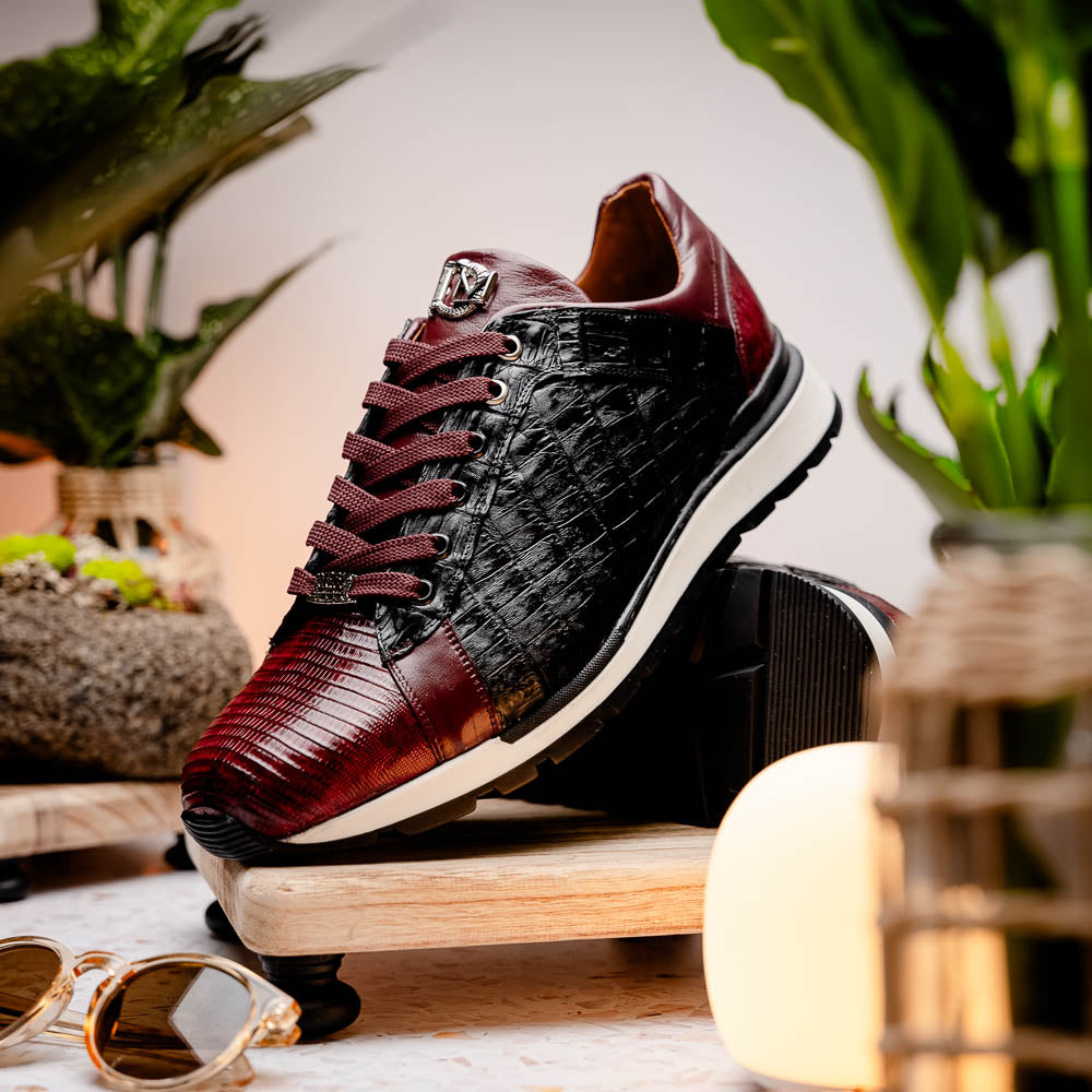 The Portici Wine / Black sneakers by Marco Di Milano are luxury shoes crafted from genuine crocodile leather with a hand-painted finish for a bold, standout look.
