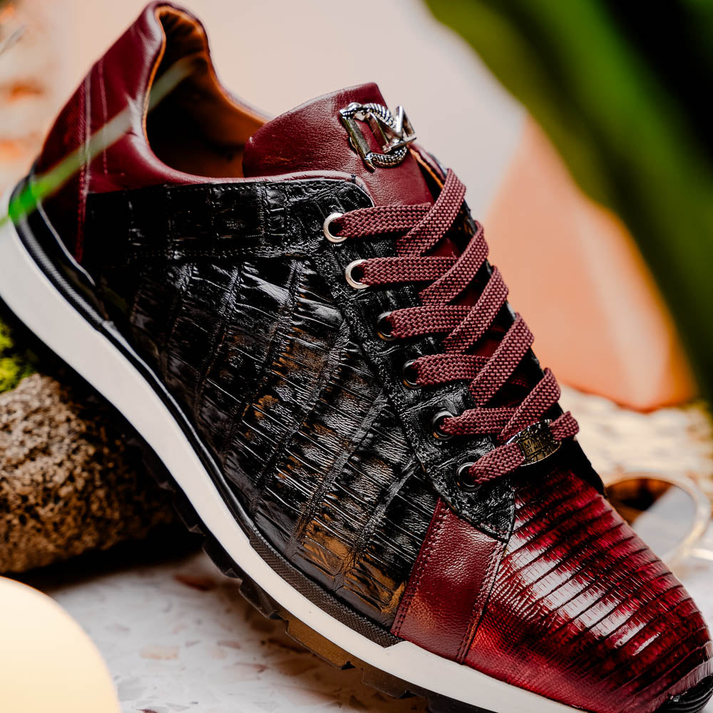 The Portici Wine / Black sneakers by Marco Di Milano are luxury shoes crafted from genuine crocodile leather with a hand-painted finish for a bold, standout look.