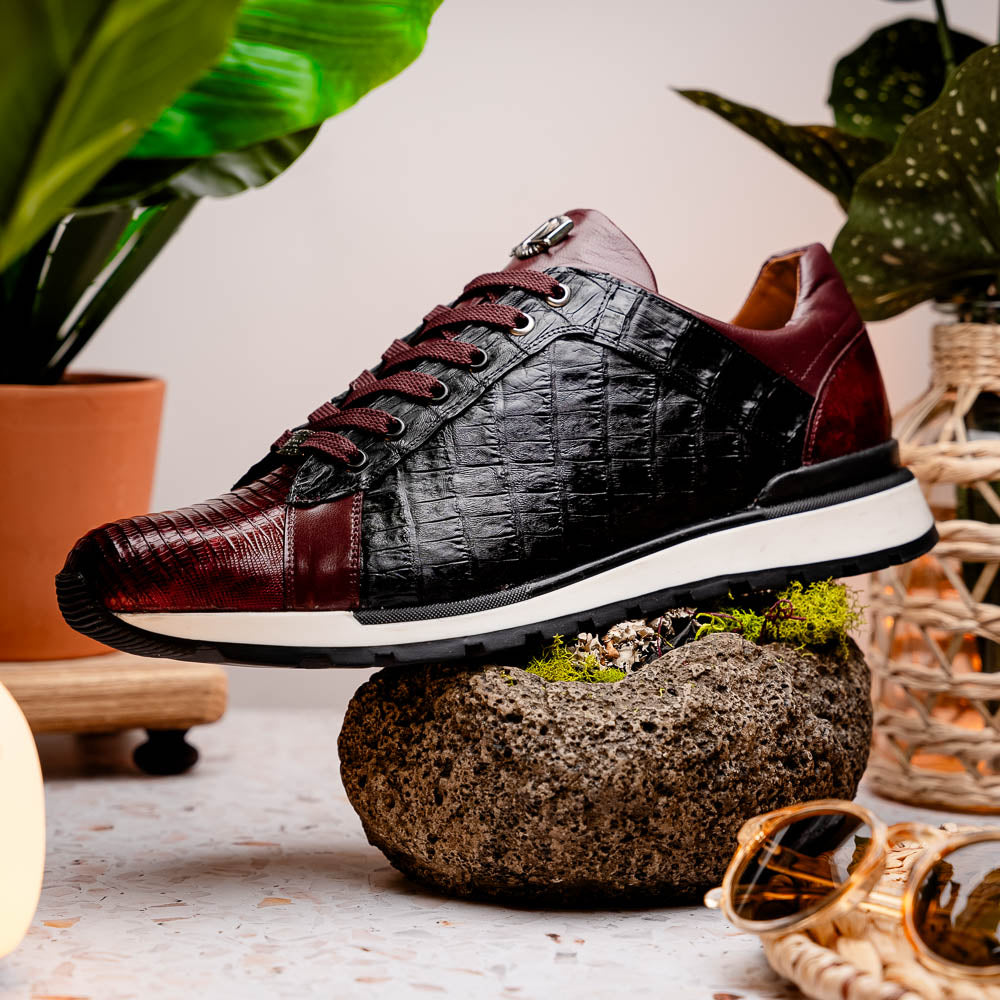 The Portici Wine / Black sneakers by Marco Di Milano are luxury shoes crafted from genuine crocodile leather with a hand-painted finish for a bold, standout look.