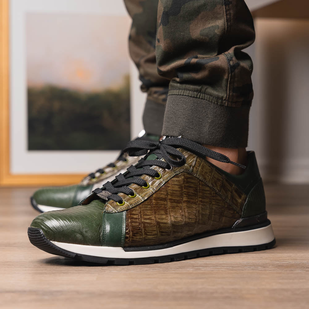 The Portici Green / Olive sneakers by Marco Di Milano feature green and brown leather with textured panels, black laces, rubber soles, and a unique hand-painted finish, all displayed against a plain white background.