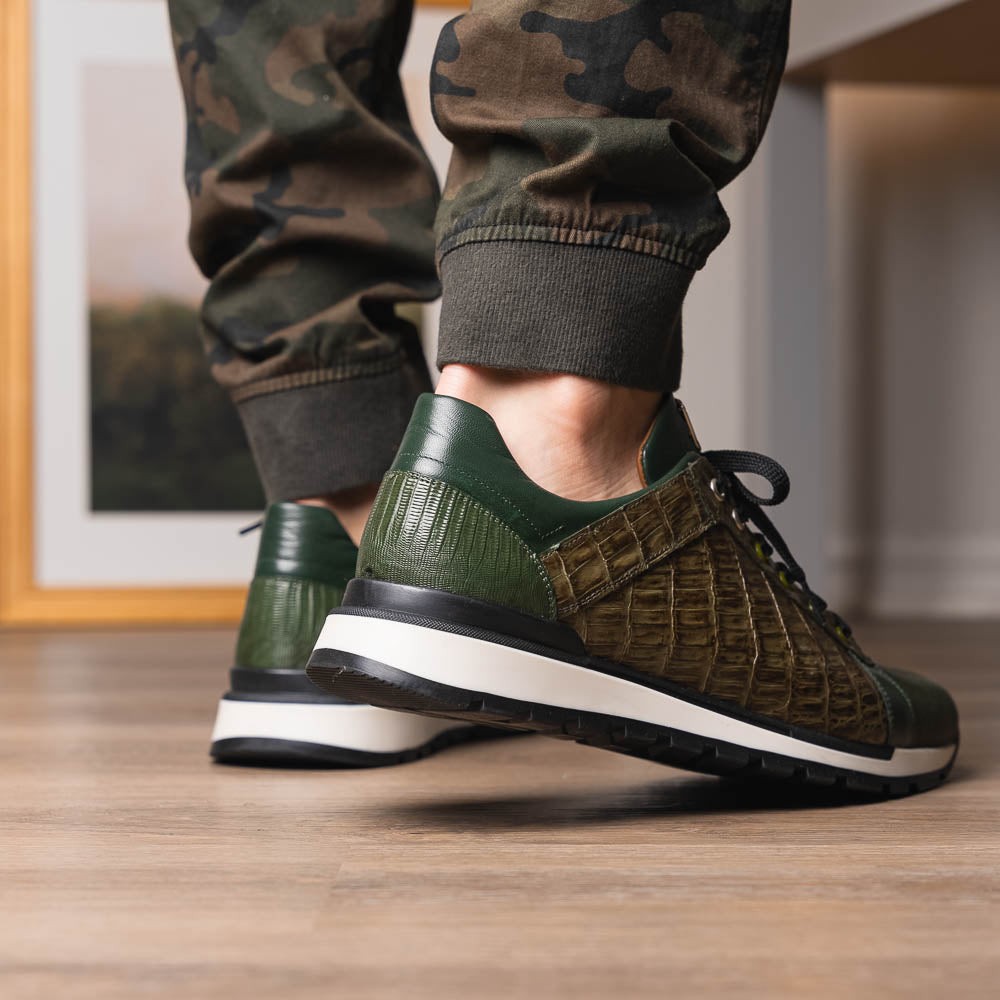 The Portici Green / Olive sneakers by Marco Di Milano feature green and brown leather with textured panels, black laces, rubber soles, and a unique hand-painted finish, all displayed against a plain white background.