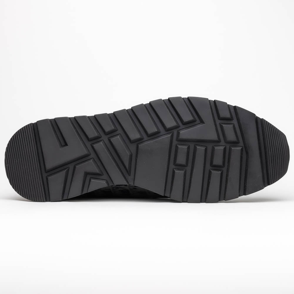The Marco Di Milano Portici Navy / Black sneaker with black laces, a white midsole, and a textured black rubber outsole is shown on a plain white background, emphasizing its luxurious design.