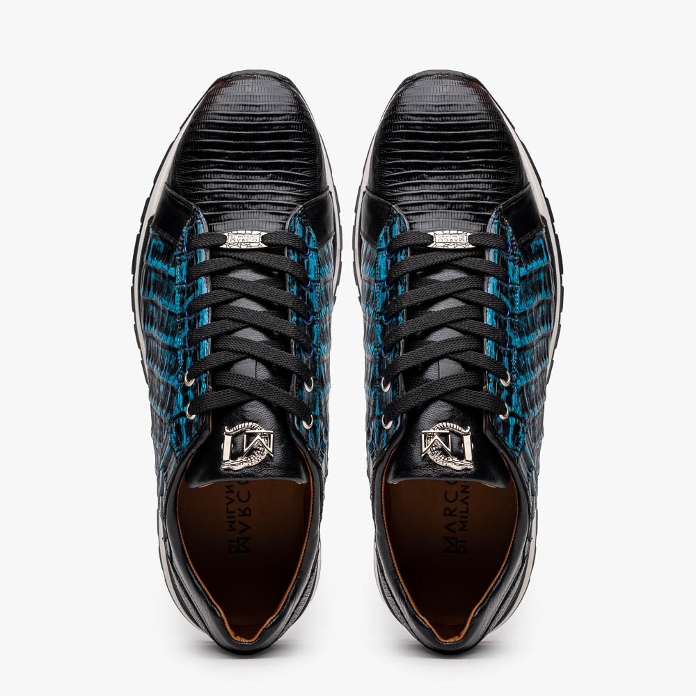 The Marco Di Milano Portici Navy / Black sneaker with black laces, a white midsole, and a textured black rubber outsole is shown on a plain white background, emphasizing its luxurious design.