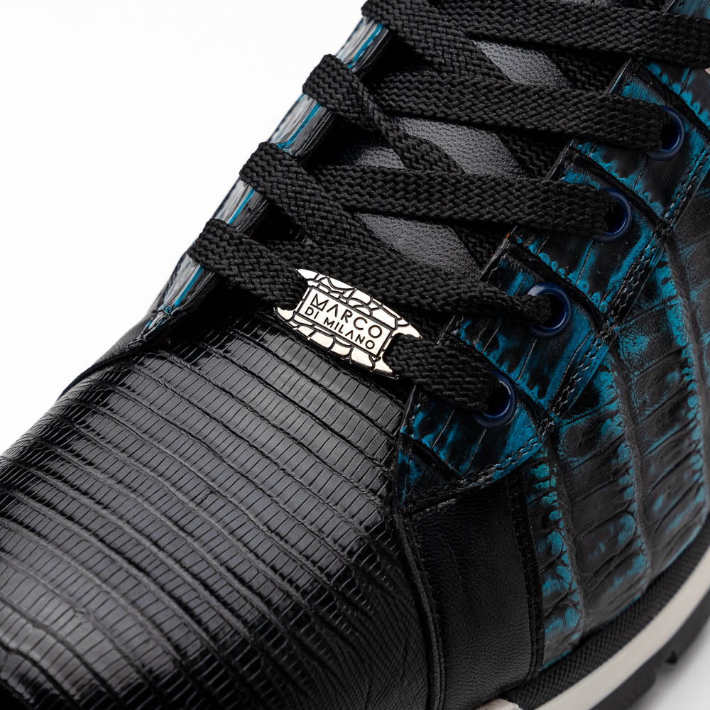 The Marco Di Milano Portici Navy / Black sneaker with black laces, a white midsole, and a textured black rubber outsole is shown on a plain white background, emphasizing its luxurious design.