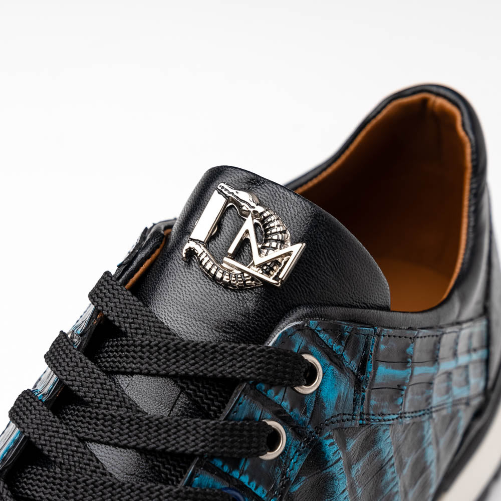 The Marco Di Milano Portici Navy / Black sneaker with black laces, a white midsole, and a textured black rubber outsole is shown on a plain white background, emphasizing its luxurious design.