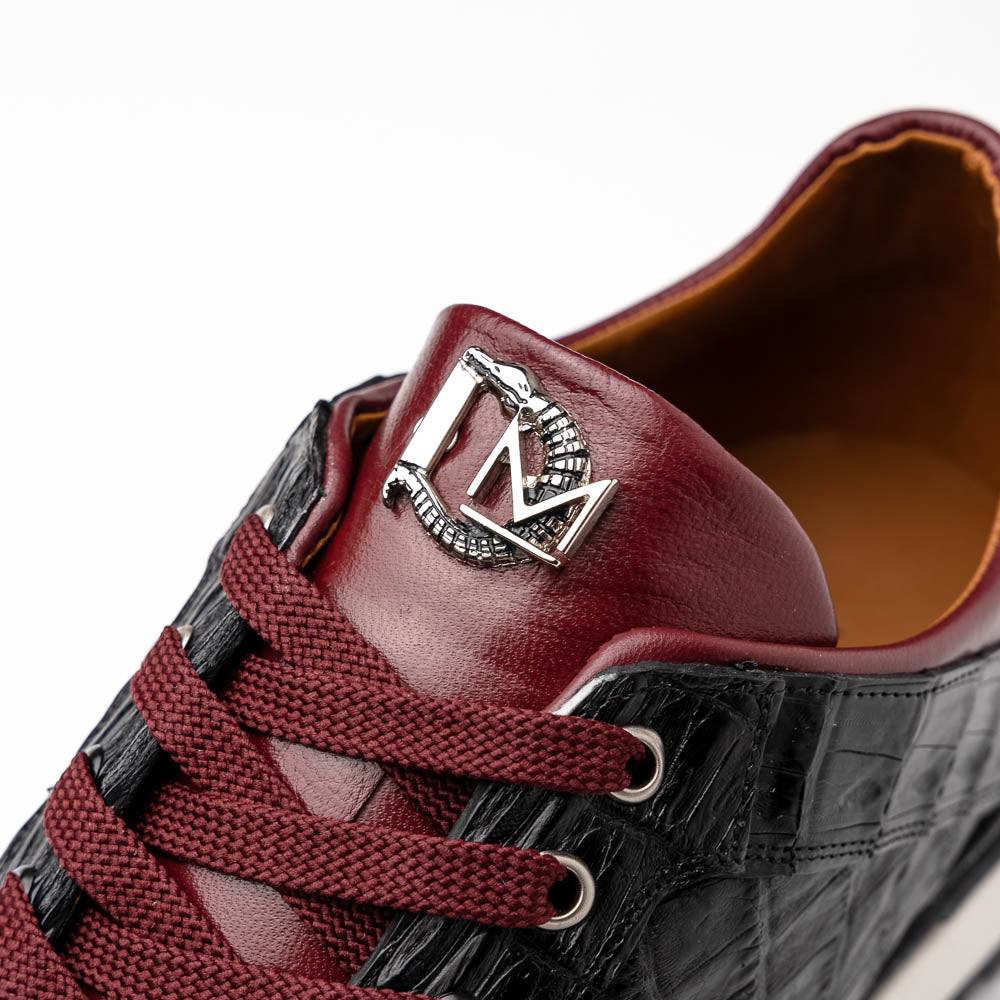 The Portici Wine / Black sneakers by Marco Di Milano are luxury shoes crafted from genuine crocodile leather with a hand-painted finish for a bold, standout look.