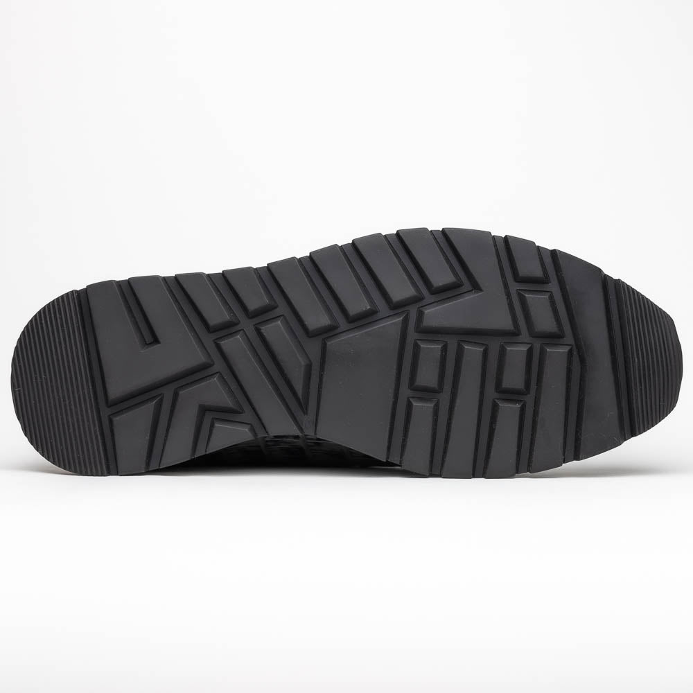 The Marco Di Milano Portici Newspaper / Black sneakers feature genuine crocodile leather in black and white with textured details and thick rubber soles, shown on a white background.
