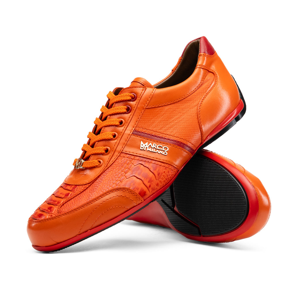Bottom view of a Portofino Orange luxury sneaker featuring a textured black rubber sole with red trim.
