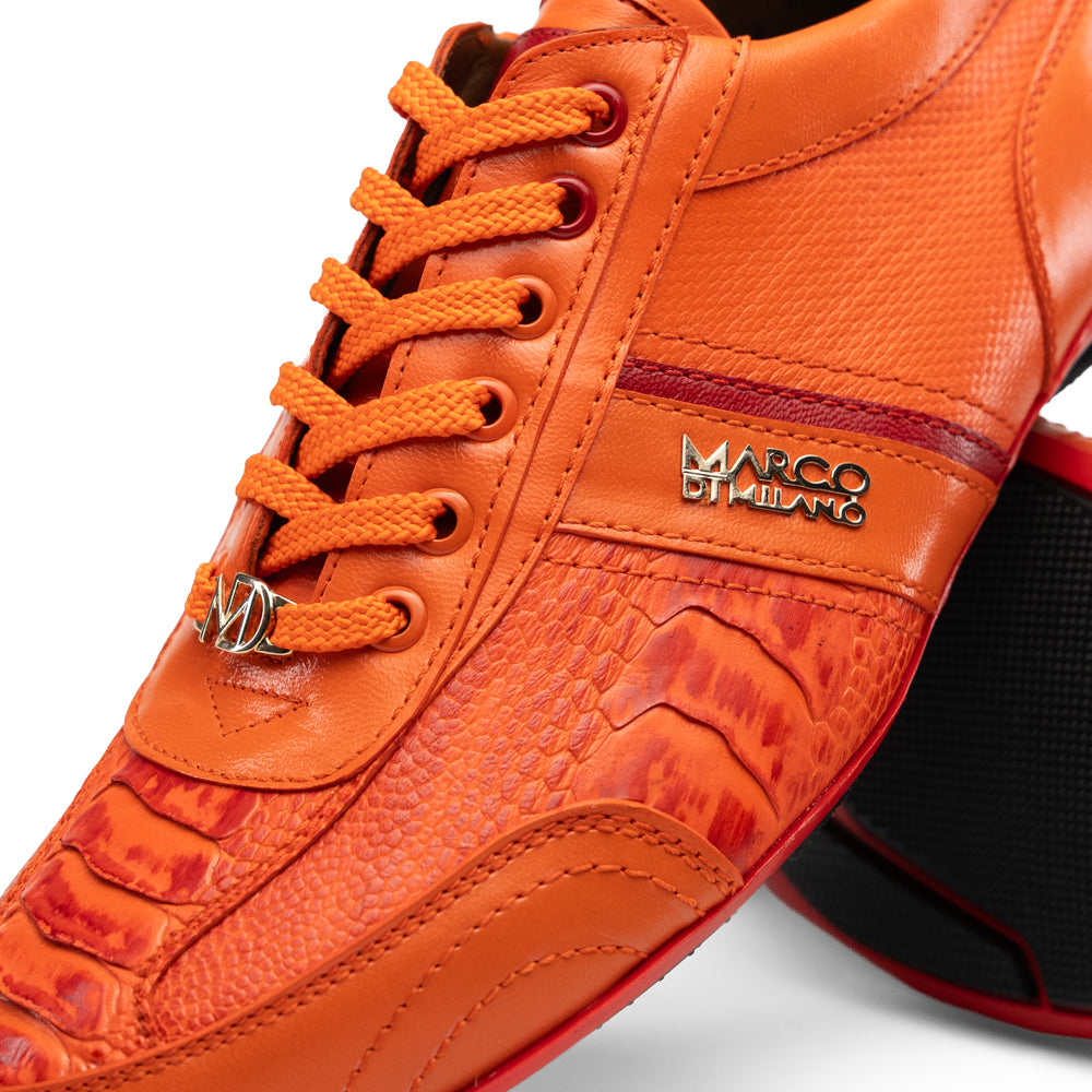 Bottom view of a Portofino Orange luxury sneaker featuring a textured black rubber sole with red trim.