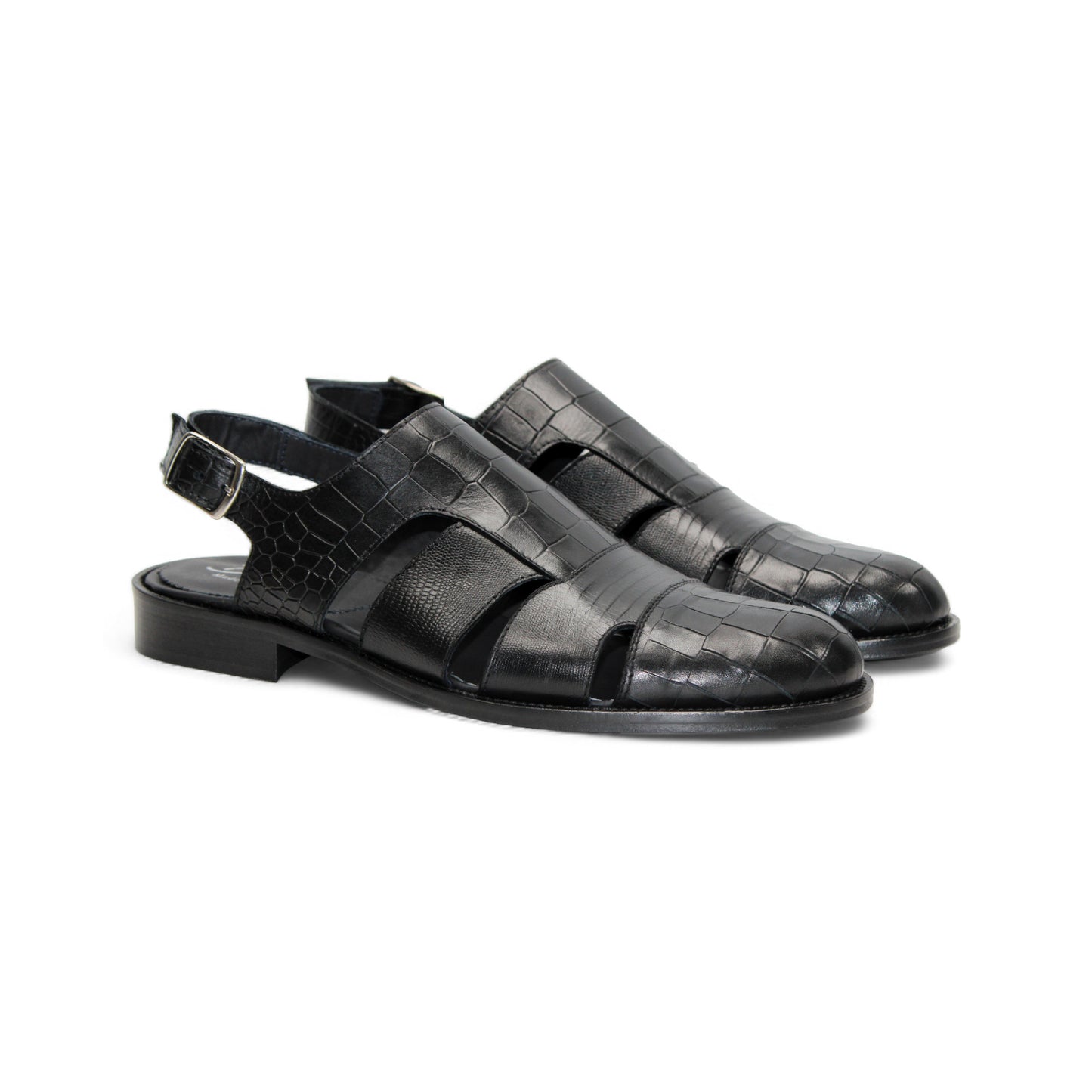 The Duca Di Matiste Duca Positano Black sandal features black leather, a closed toe, cut-out sides, buckled slingback strap, and flat sole—Italian craftsmanship—shown in profile on a white background.
