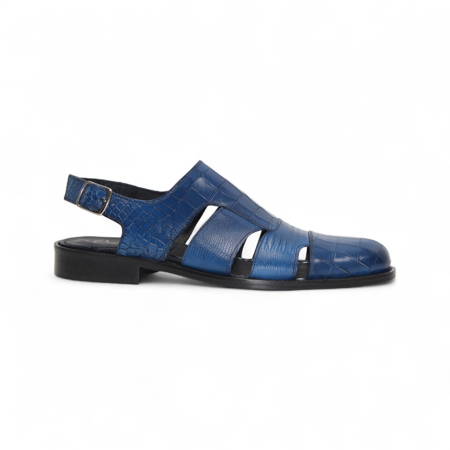 The Duca Di Matiste Duca Positano Ocean Blue is a closed-toe sandal with cut-out sides, an adjustable heel strap, and textured leather, showcasing Italian craftsmanship against a white background.