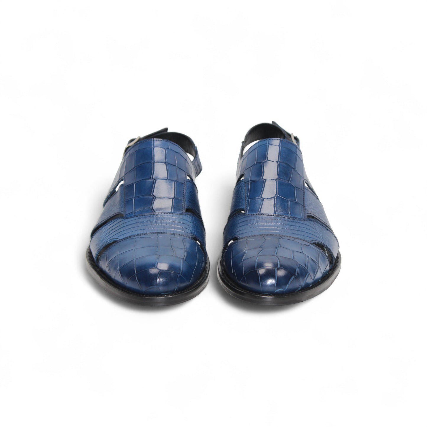 The Duca Di Matiste Duca Positano Ocean Blue is a closed-toe sandal with cut-out sides, an adjustable heel strap, and textured leather, showcasing Italian craftsmanship against a white background.