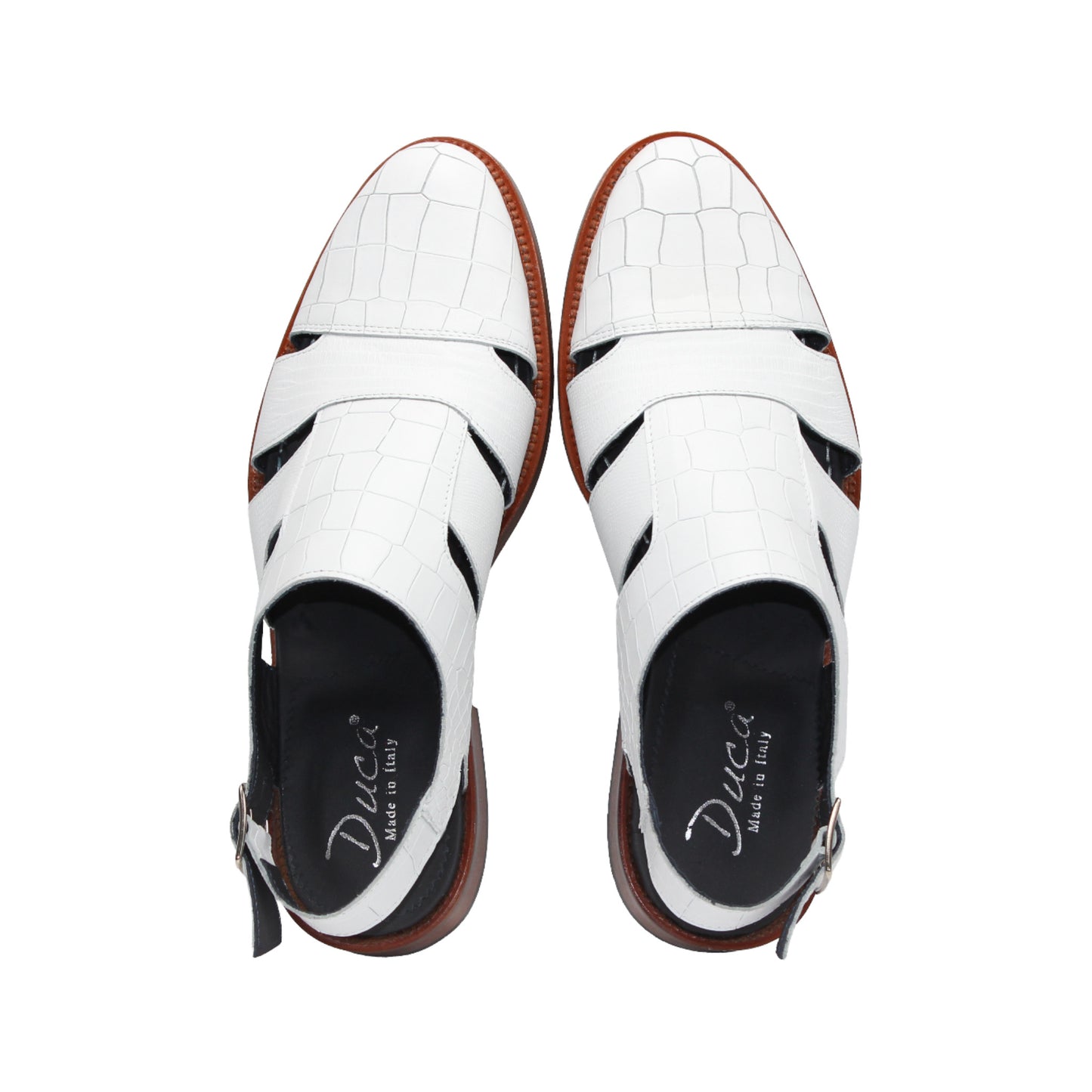 The Duca Di Matiste Positano (White) sandal by Duca Di Matiste features white croco leather, a closed toe, cutout sides, ankle strap with buckle, and brown sole, shown on a plain white background.