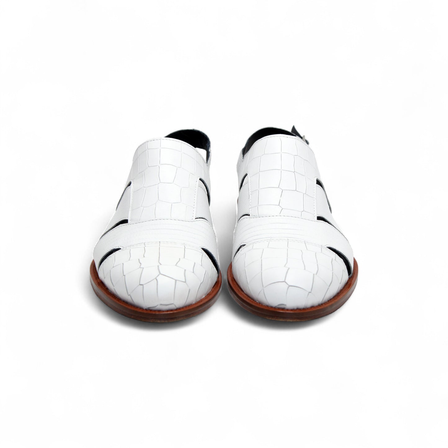 The Duca Di Matiste Positano (White) sandal by Duca Di Matiste features white croco leather, a closed toe, cutout sides, ankle strap with buckle, and brown sole, shown on a plain white background.