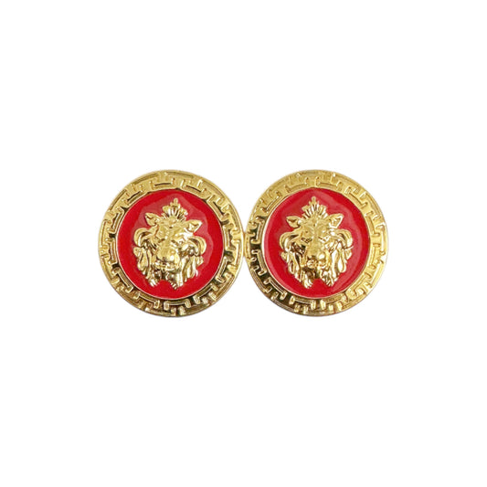 The Matiste Red/Gold Cufflinks by Matiste feature a lion head motif on a red background with a decorative gold border, inspired by classic Italian designs.