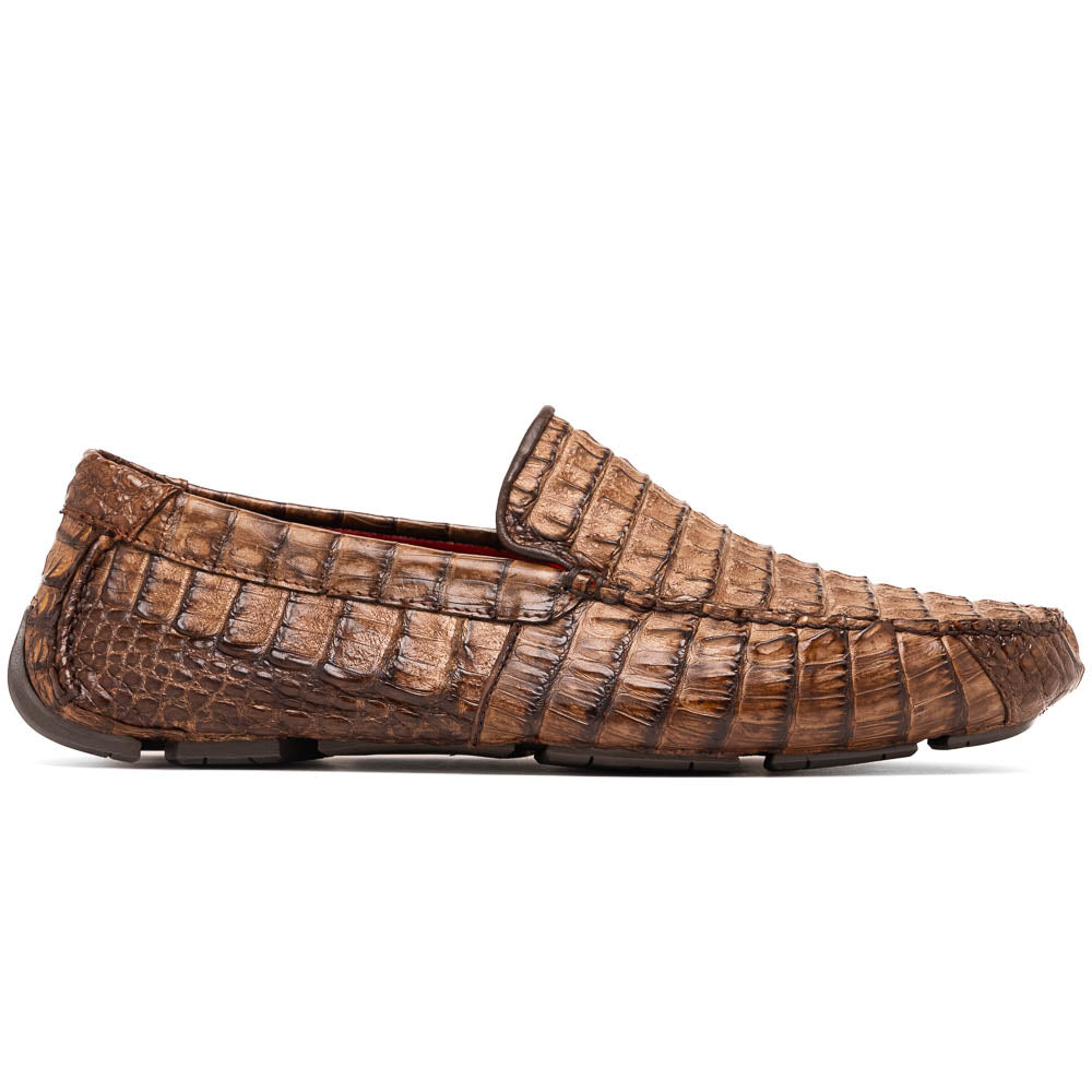 The Remo Washed Brown by Marco Di Milano features luxurious men's loafers with a crocodile texture. One shoe stands upright while the other lies on its side, revealing the detailed sole.