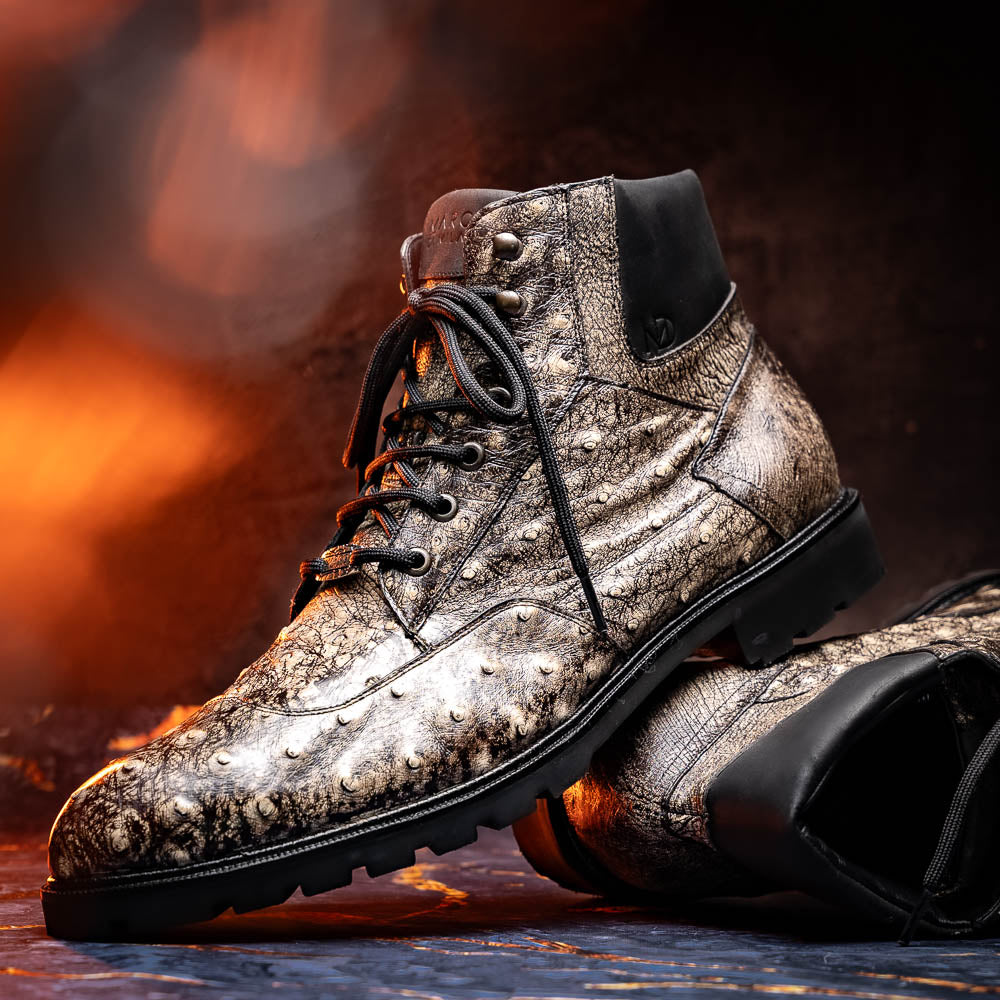 The Renzo Stone Black boots by Marco Di Milano feature genuine ostrich leather in brown, black laces, and black rubber soles—luxury footwear with a unique exotic flair.