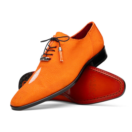 Rimini Orange men’s exotic lace-up dress shoes by Marco Di Milano, expertly crafted from genuine stingray leather in a bright orange hue with black laces; one shoe stands upright while the other lies on its side, showcasing the vibrant red sole and contrasting black heel.