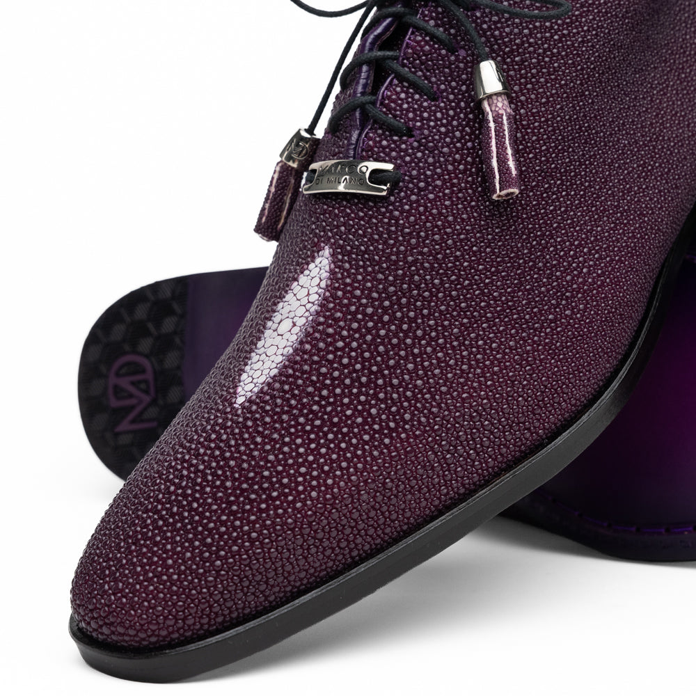 The Rimini Purple by Marco Di Milano is a single purple textured exotic lace-up shoe with black laces, shown from above, featuring a decorative metal and crystal accessory on the tongue.