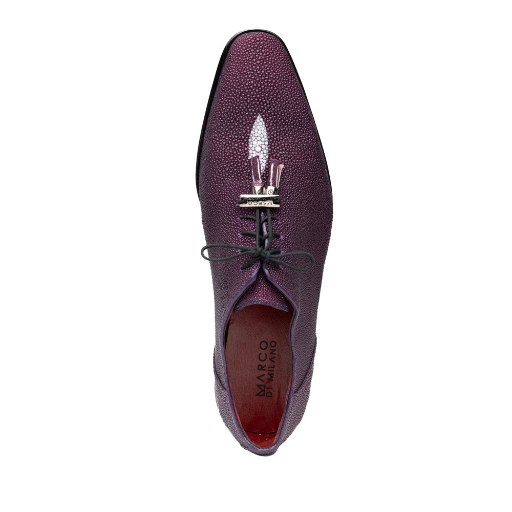 A pair of Marco Di Milano Rimini Purple textured leather dress shoes with black laces and tassel accents, featuring one shoe upright and the other on its side to showcase the bold purple sole—an eye-catching exotic lace-up design crafted to stand out.