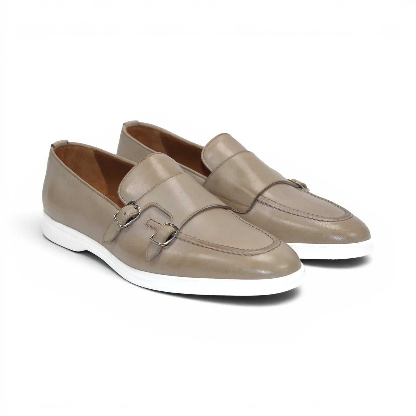 The Duca Rimini Beige by Duca Di Matiste is an Italian-crafted loafer in premium calf leather with a white rubber sole and metal buckle, shown in profile on a plain white background—ideal for timeless sophistication.