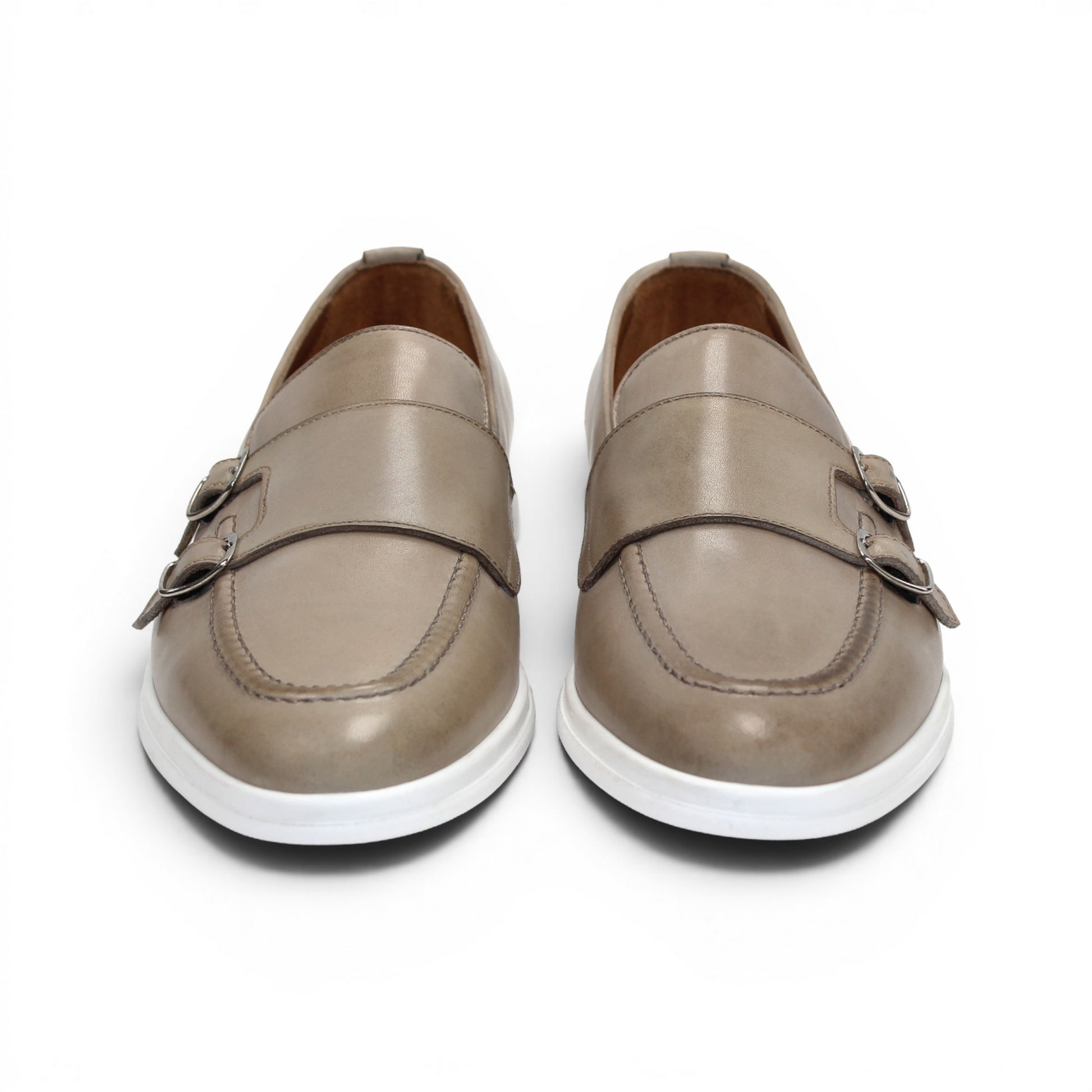 The Duca Rimini Beige by Duca Di Matiste is an Italian-crafted loafer in premium calf leather with a white rubber sole and metal buckle, shown in profile on a plain white background—ideal for timeless sophistication.