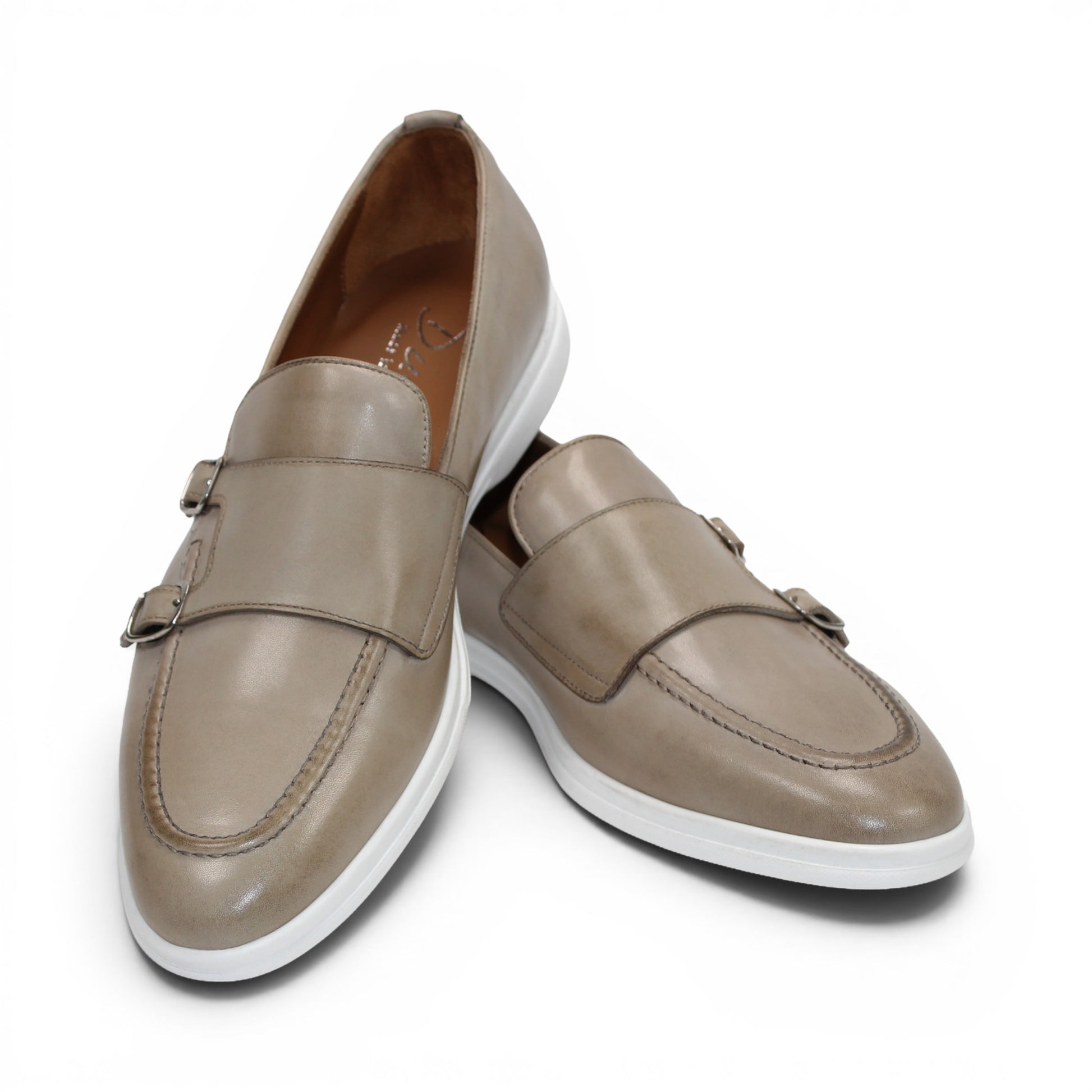The Duca Rimini Beige by Duca Di Matiste is an Italian-crafted loafer in premium calf leather with a white rubber sole and metal buckle, shown in profile on a plain white background—ideal for timeless sophistication.