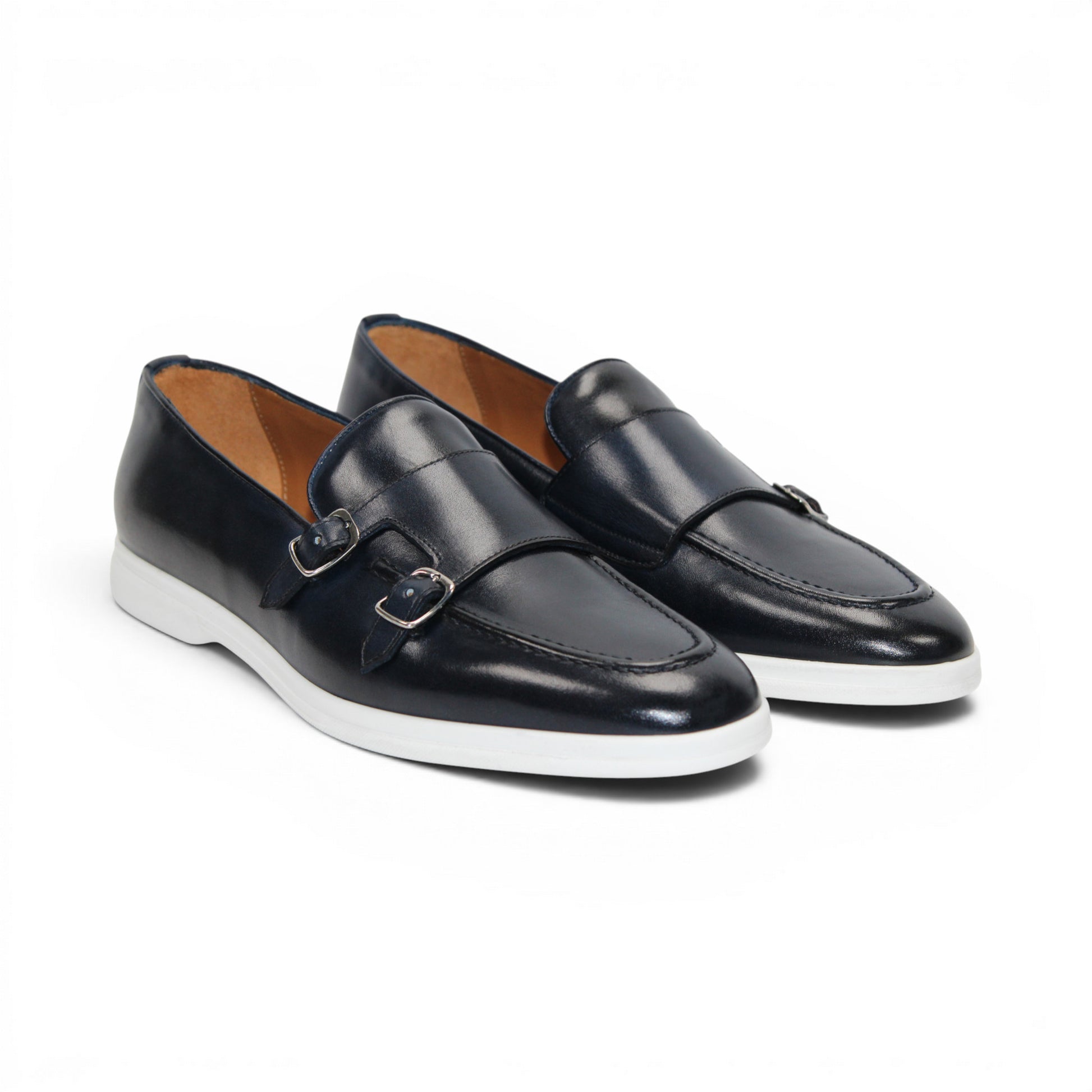 The Duca Rimini Navy by Duca Di Matiste, crafted in premium navy calf leather with double buckle straps and a white rubber sole, is displayed in profile on a plain white background, exuding timeless sophistication.