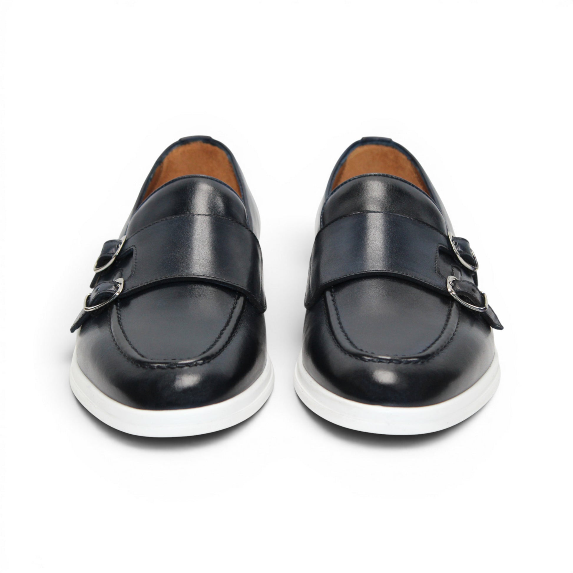 The Duca Rimini Navy by Duca Di Matiste, crafted in premium navy calf leather with double buckle straps and a white rubber sole, is displayed in profile on a plain white background, exuding timeless sophistication.