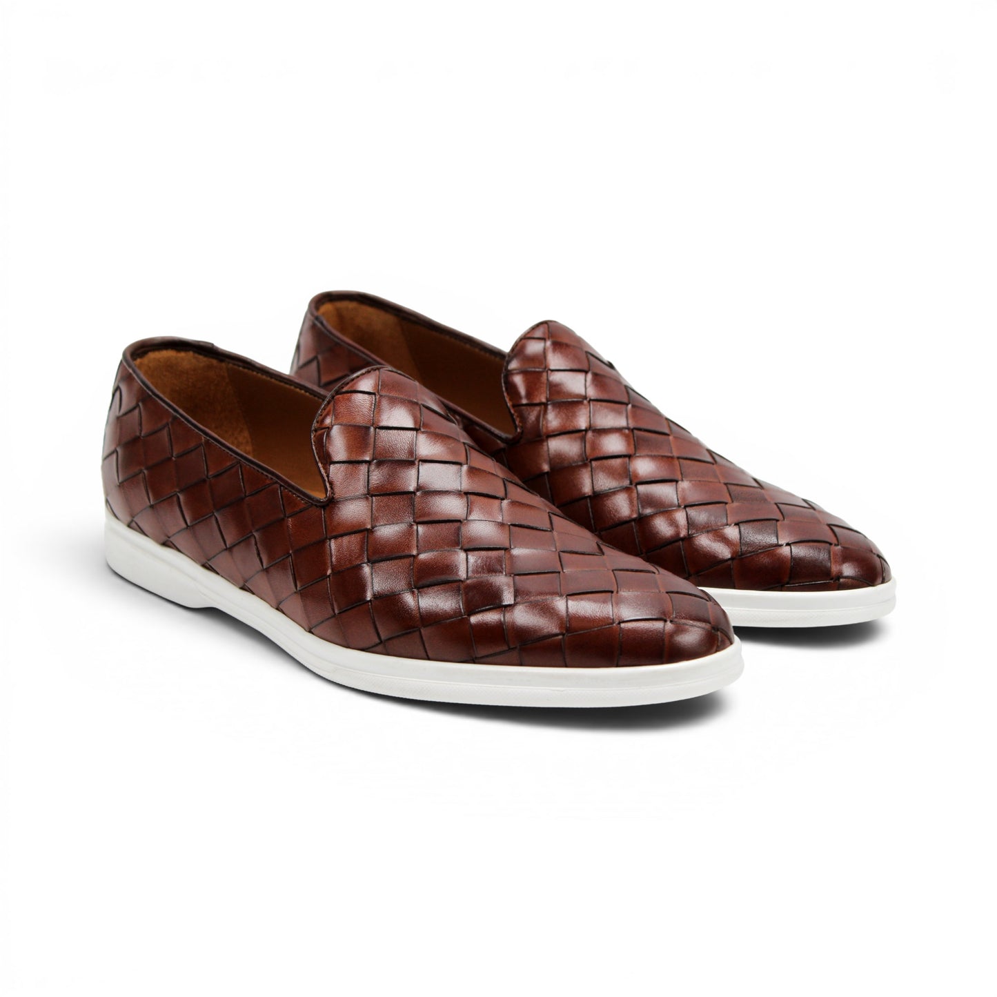 The Duca Di Matiste Duca Rivoli Marrone is a brown woven leather slip-on with a white rubber sole, displayed in side view against a plain white background, highlighting luxury footwear.