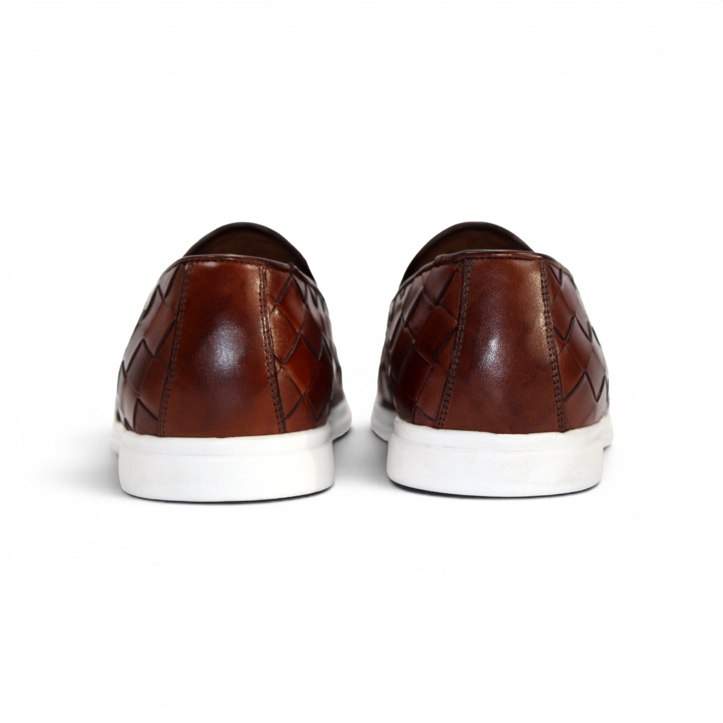 The Duca Di Matiste Duca Rivoli Marrone is a brown woven leather slip-on with a white rubber sole, displayed in side view against a plain white background, highlighting luxury footwear.