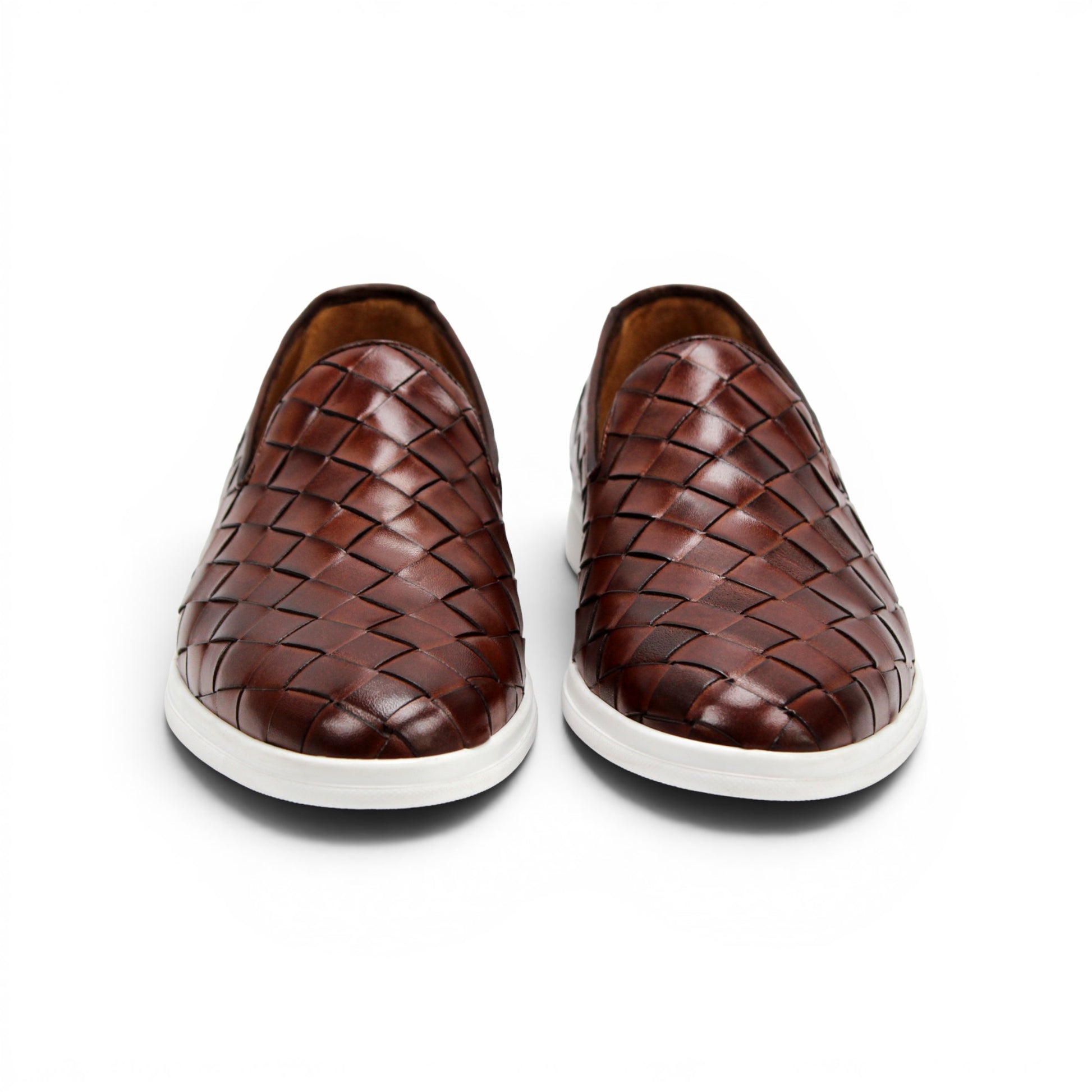 The Duca Di Matiste Duca Rivoli Marrone is a brown woven leather slip-on with a white rubber sole, displayed in side view against a plain white background, highlighting luxury footwear.