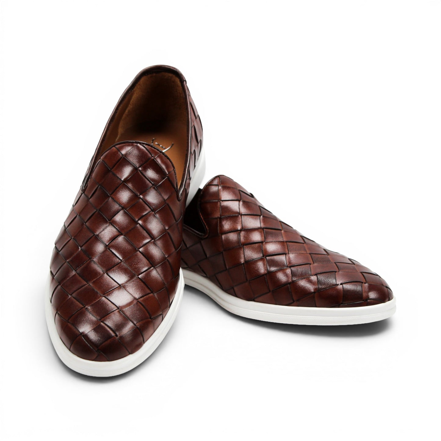 The Duca Di Matiste Duca Rivoli Marrone is a brown woven leather slip-on with a white rubber sole, displayed in side view against a plain white background, highlighting luxury footwear.