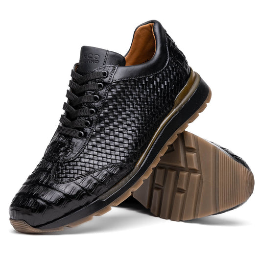 The Marco Di Milano Roma Black features luxury black woven calfskin sneakers with black laces and brown rubber soles—one shoe stands upright while the other leans against it.