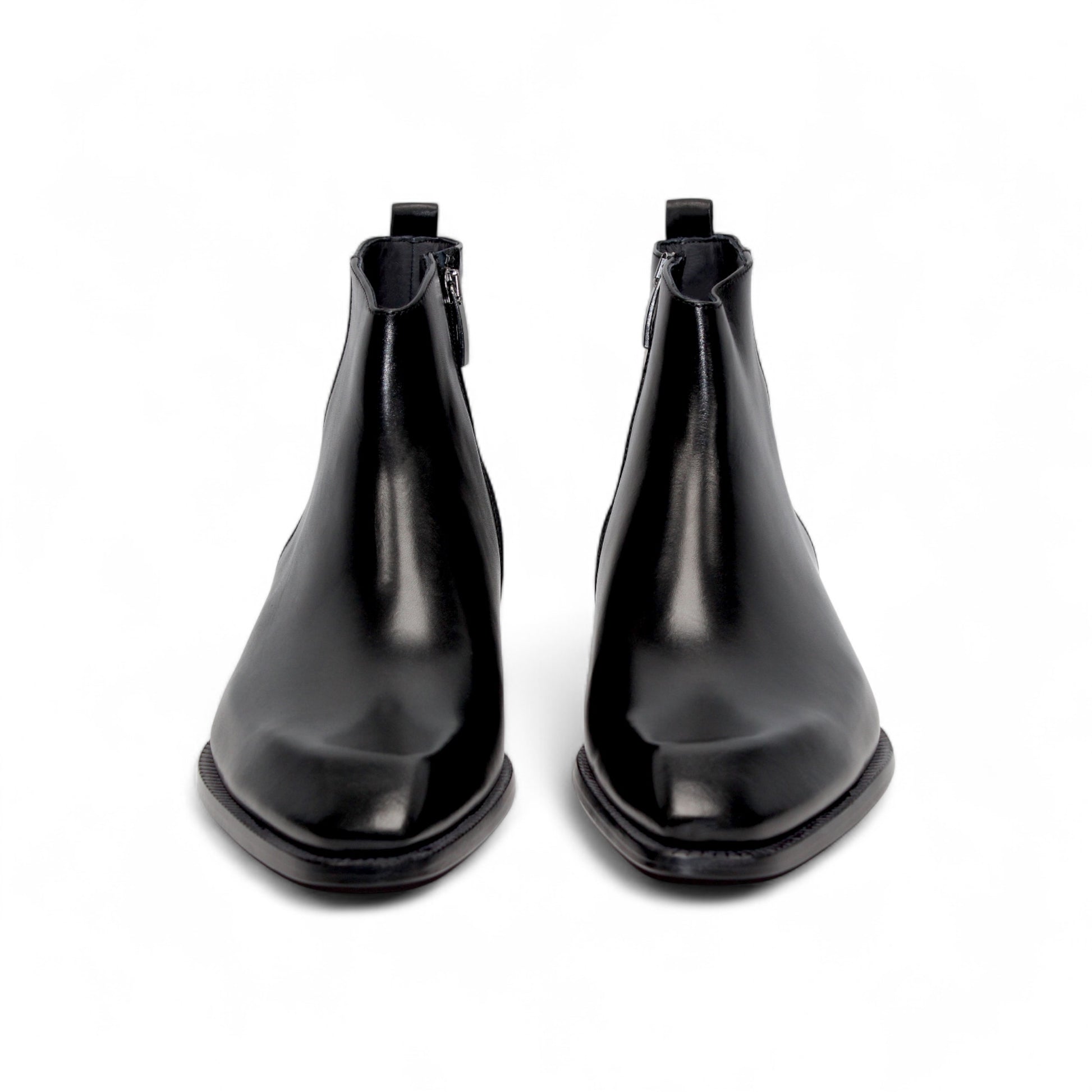 The Duca Di Matiste Duca Romano Black ankle boot features black leather, a low heel, and side zipper, expertly handcrafted in Italy and shown in profile on a plain white background.