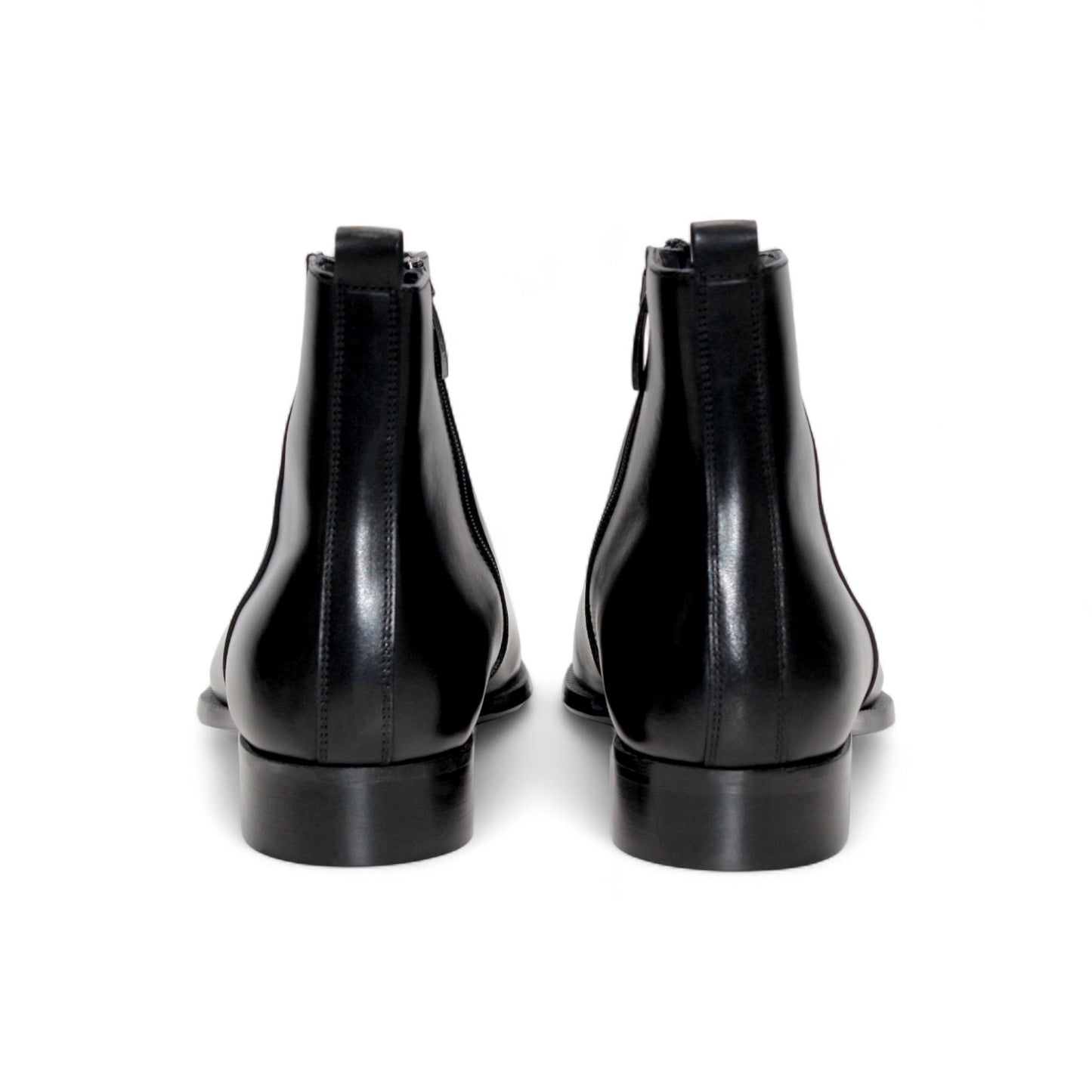 The Duca Di Matiste Duca Romano Black ankle boot features black leather, a low heel, and side zipper, expertly handcrafted in Italy and shown in profile on a plain white background.