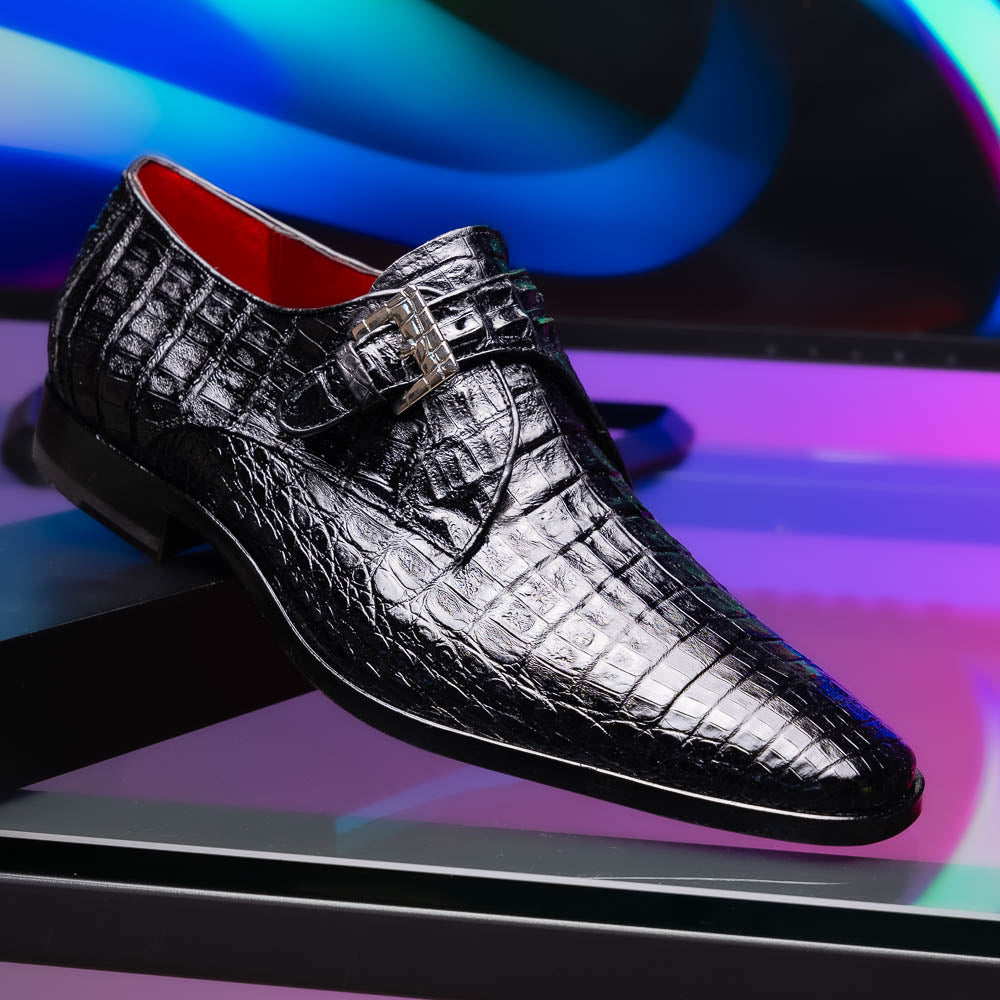 The Marco Di Milano Rovigo Black is a luxury monk strap dress shoe featuring genuine caiman crocodile, a pointed toe, metal buckle, and brown leather sole, displayed on a clean white background.