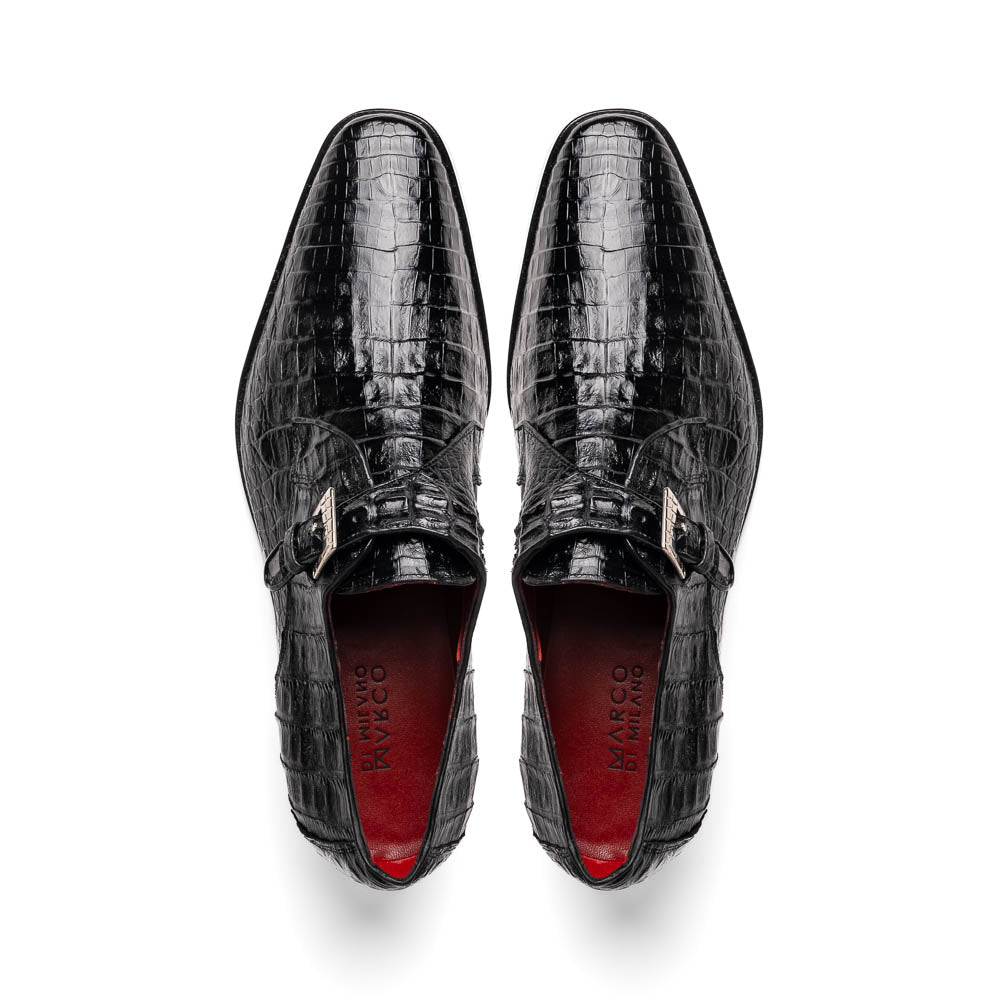 The Marco Di Milano Rovigo Black is a luxury monk strap dress shoe featuring genuine caiman crocodile, a pointed toe, metal buckle, and brown leather sole, displayed on a clean white background.