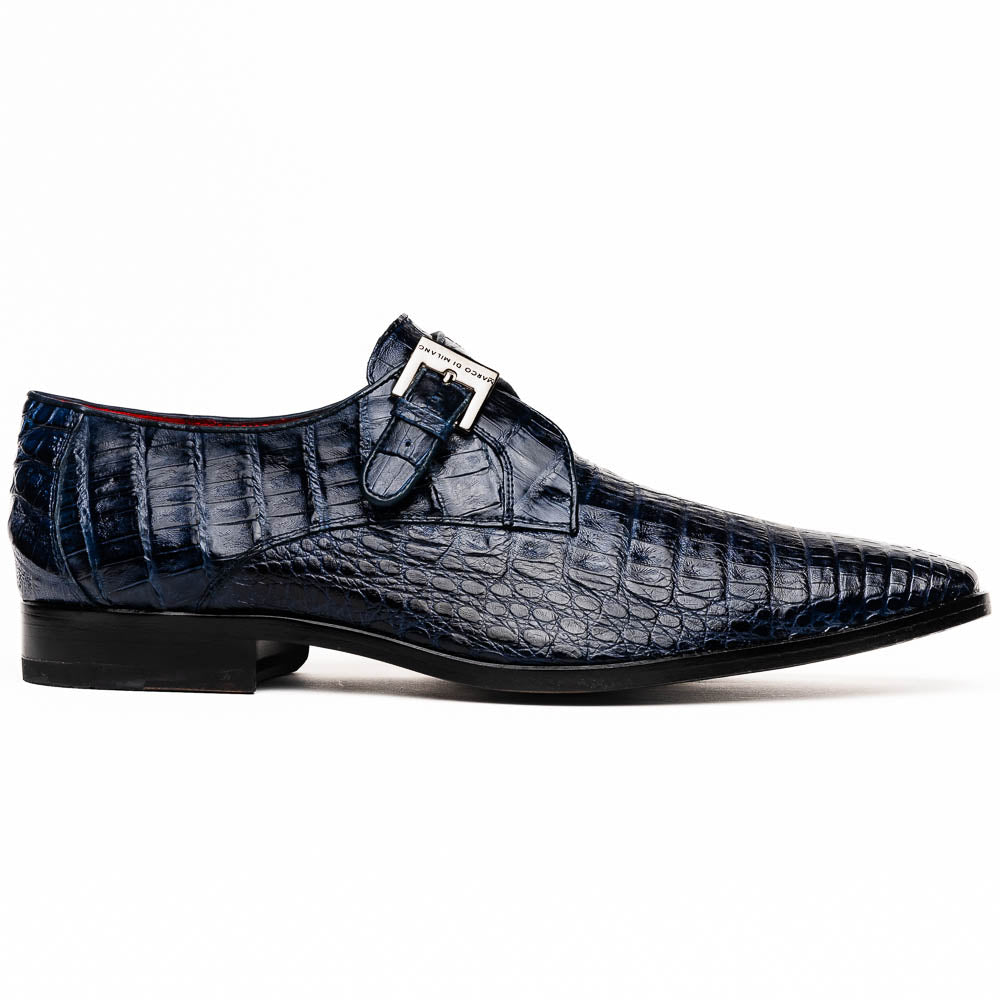 The Marco Di Milano Rovigo Navy features dark blue genuine caiman crocodile monk strap dress shoes with a silver buckle—one upright, the other on its side to display the sole—ideal for luxury men's footwear enthusiasts.