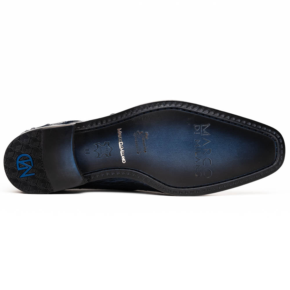 The Marco Di Milano Rovigo Navy features dark blue genuine caiman crocodile monk strap dress shoes with a silver buckle—one upright, the other on its side to display the sole—ideal for luxury men's footwear enthusiasts.