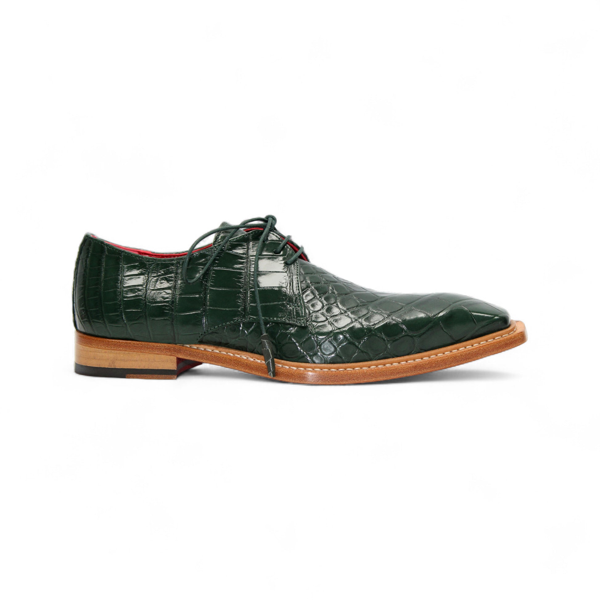 The Fennix Rowan Green by Fennix of Italy is a dark green, crocodile-patterned leather dress shoe with laces, brown sole, and low heel, crafted in Italy and shown from the side on a white background.