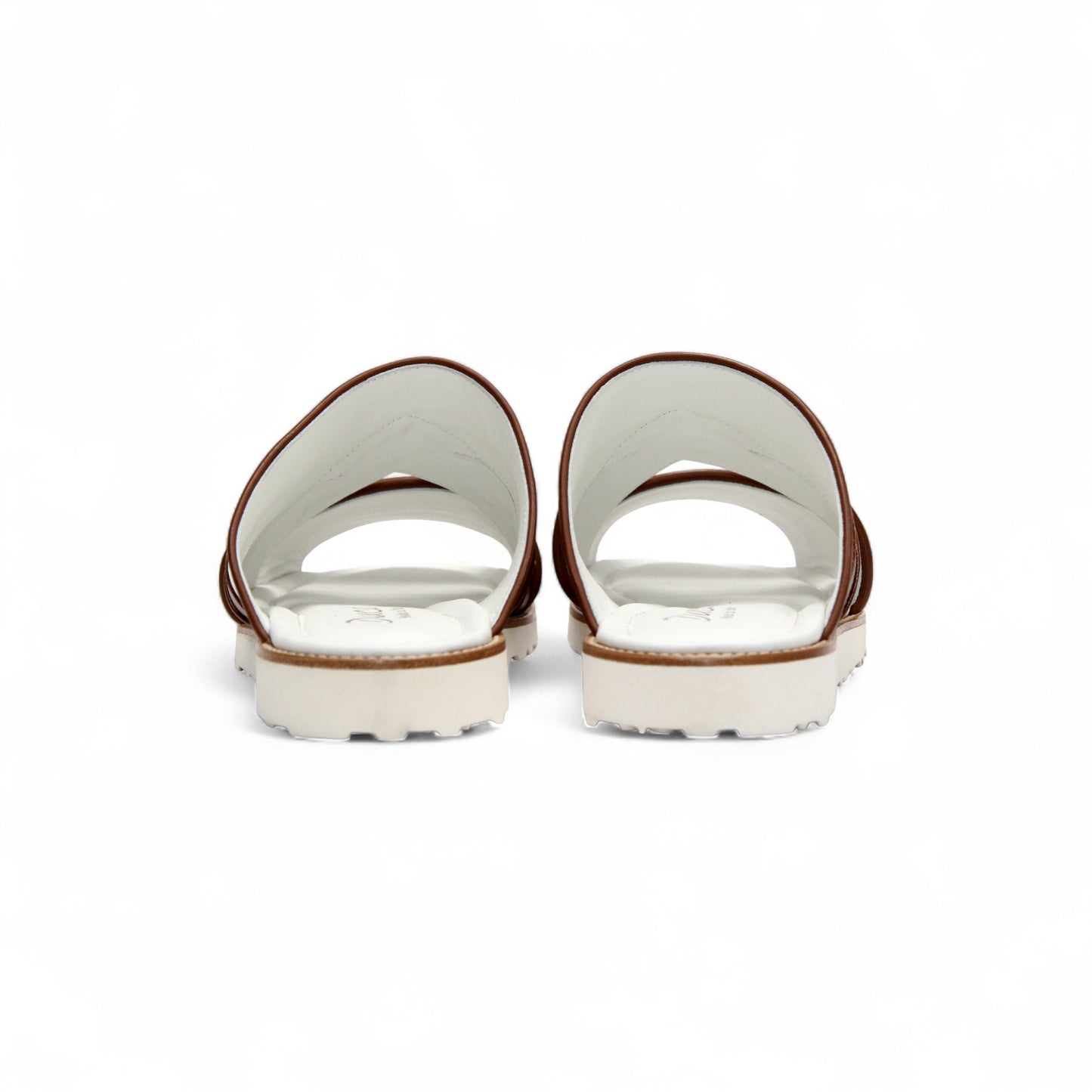 The Duca Di Matiste Duca SA118 Ambra/White is a flat sandal featuring white and brown Italian leather crisscross straps and a white sole—ideal for those who love modern Italian footwear.