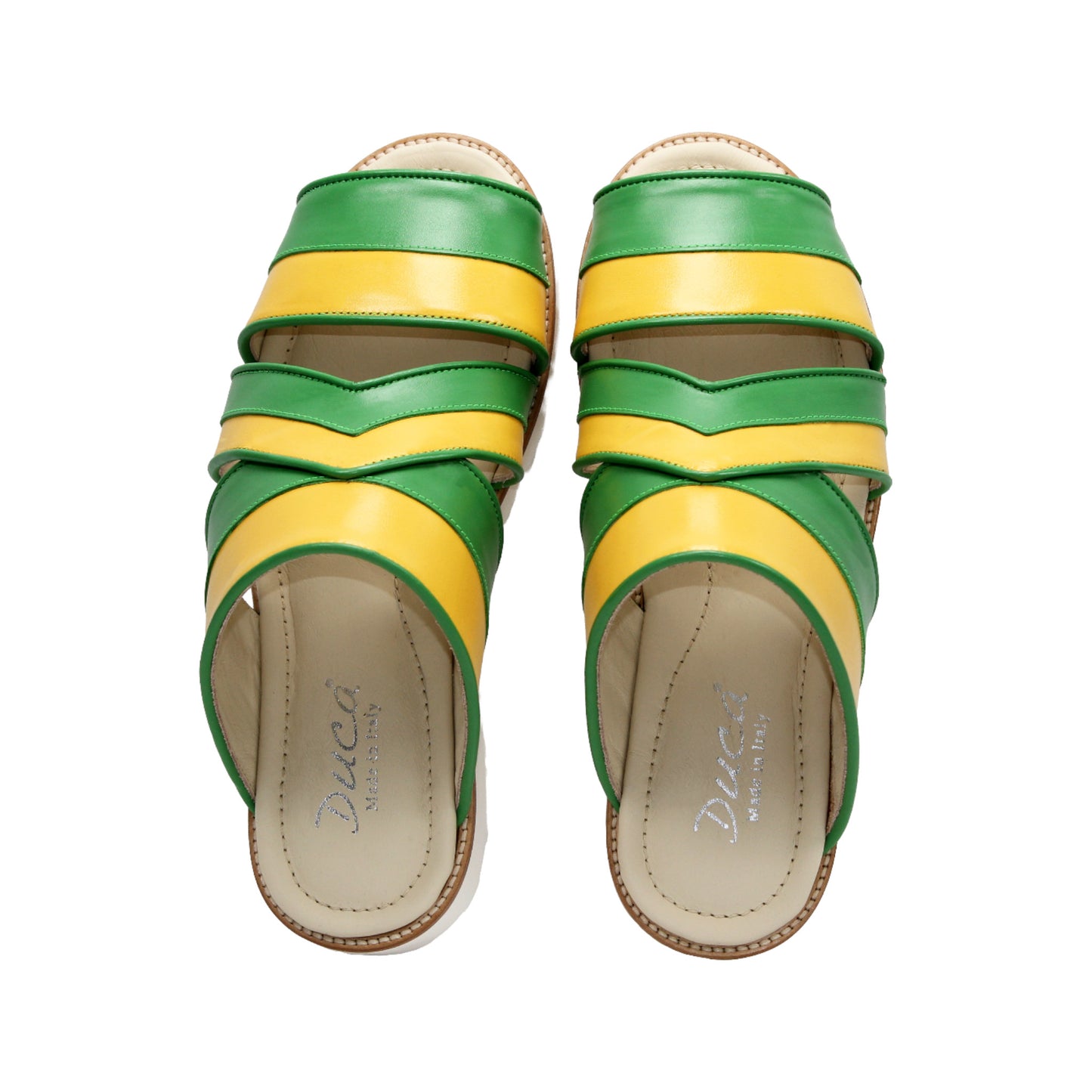 The Duca Di Matiste Duca SA118 Green/Yellow is a flat sandal with green and yellow leather straps and a white ridged sole, inspired by modern Italian footwear and shown in side profile on a plain white background.