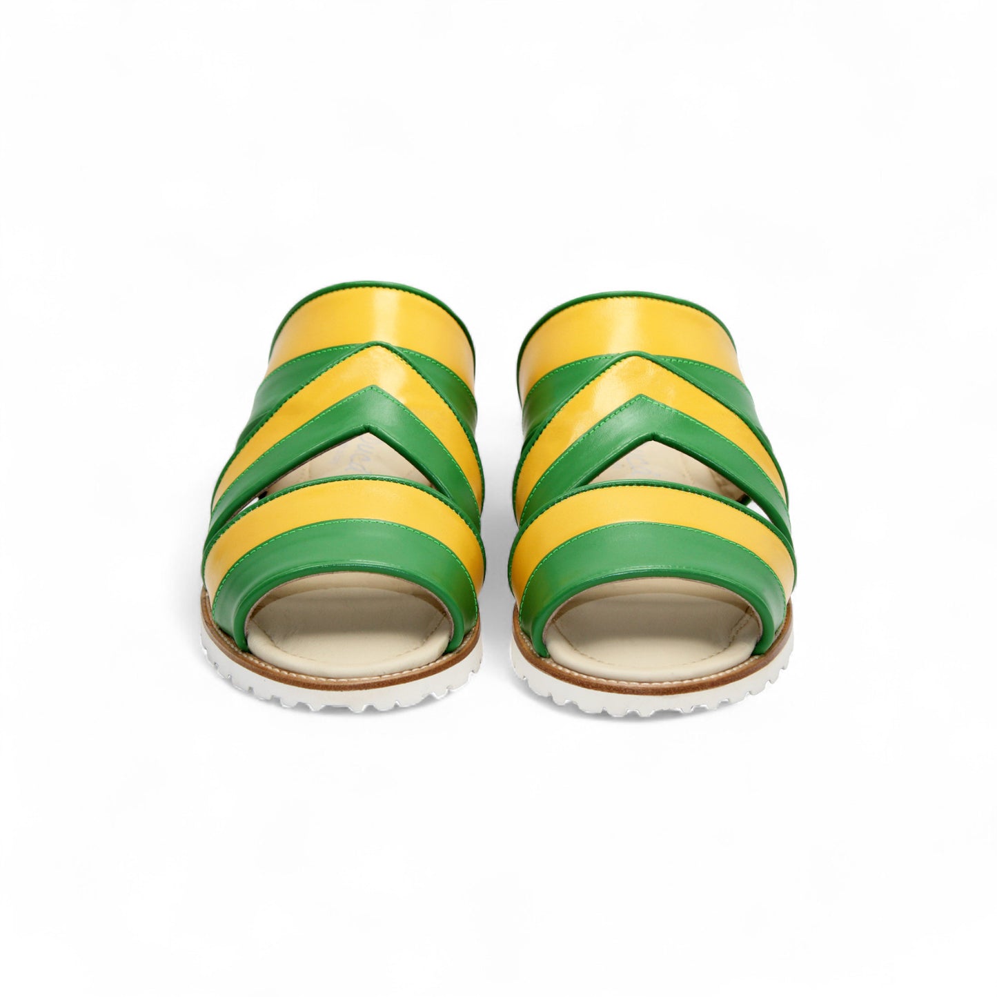 The Duca Di Matiste Duca SA118 Green/Yellow is a flat sandal with green and yellow leather straps and a white ridged sole, inspired by modern Italian footwear and shown in side profile on a plain white background.