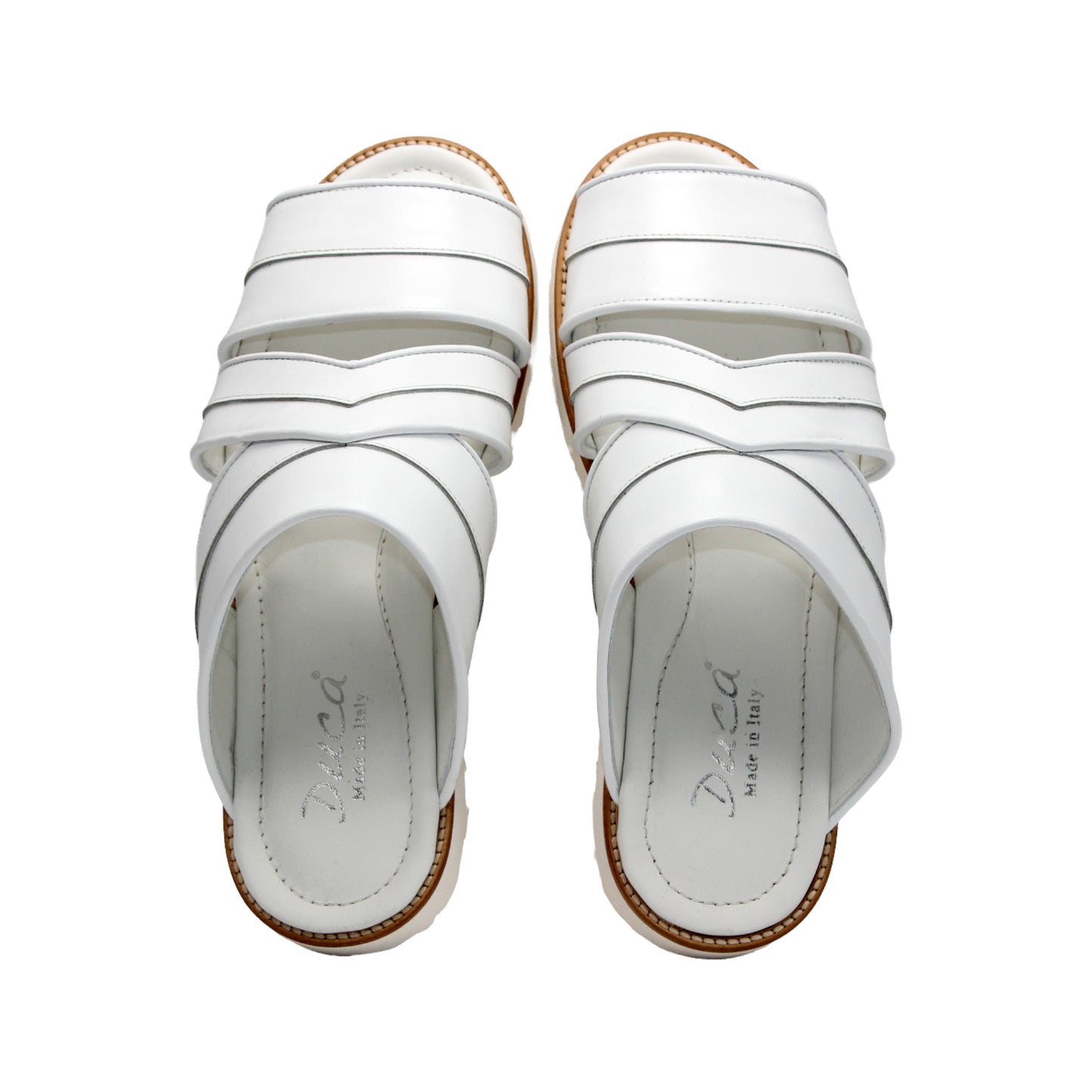The Duca Di Matiste Duca SA118 White sandal features a modern Italian design with multiple straps, an open toe, flat sole, subtle tread, and effortless style—shown from the side.