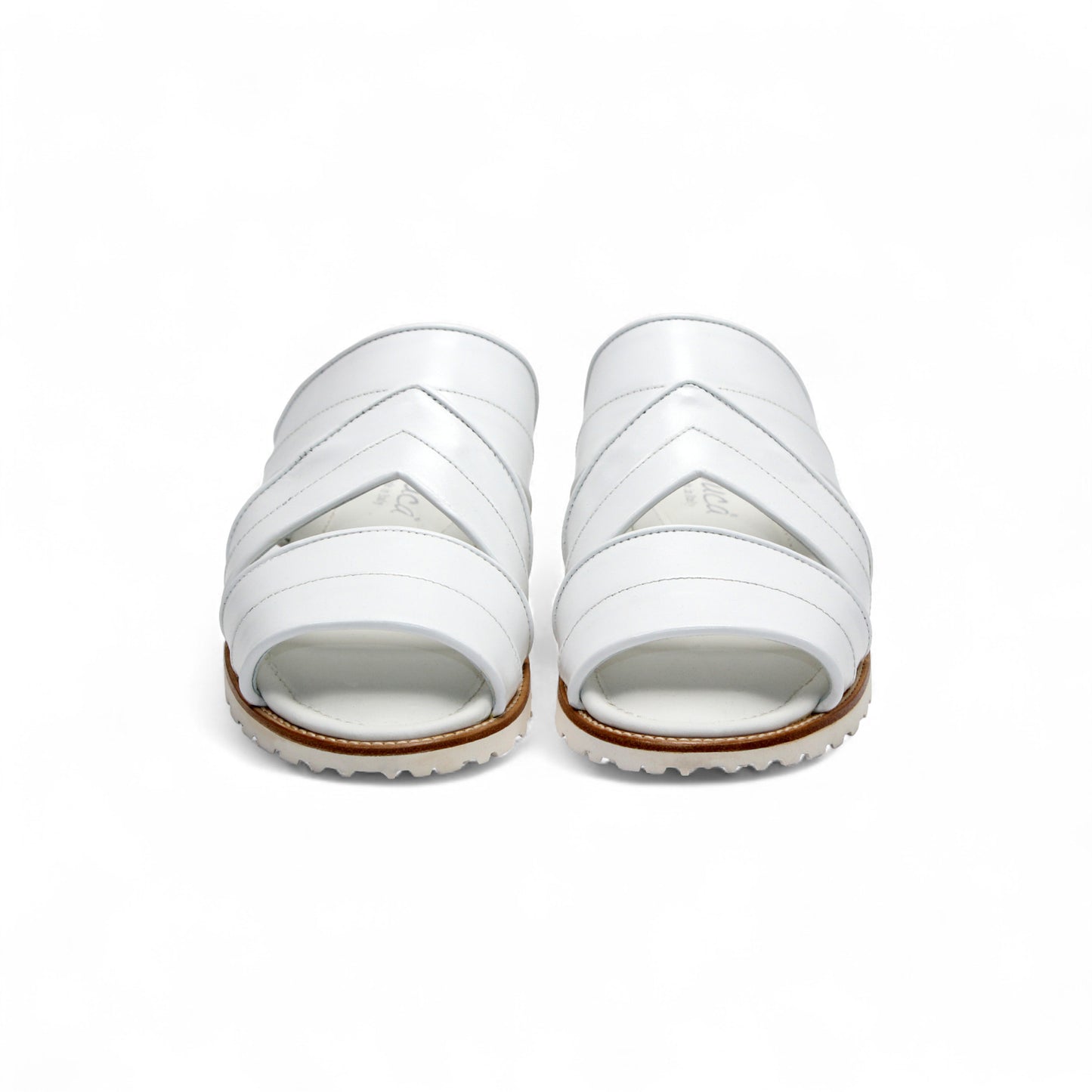 The Duca Di Matiste Duca SA118 White sandal features a modern Italian design with multiple straps, an open toe, flat sole, subtle tread, and effortless style—shown from the side.