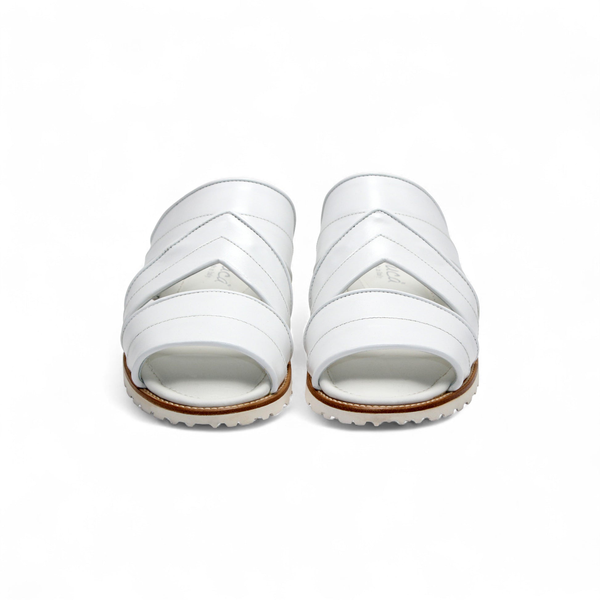 The Duca Di Matiste Duca SA118 White sandal features a modern Italian design with multiple straps, an open toe, flat sole, subtle tread, and effortless style—shown from the side.