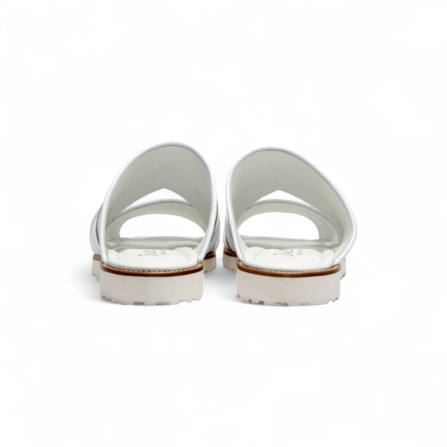 The Duca Di Matiste Duca SA118 White sandal features a modern Italian design with multiple straps, an open toe, flat sole, subtle tread, and effortless style—shown from the side.